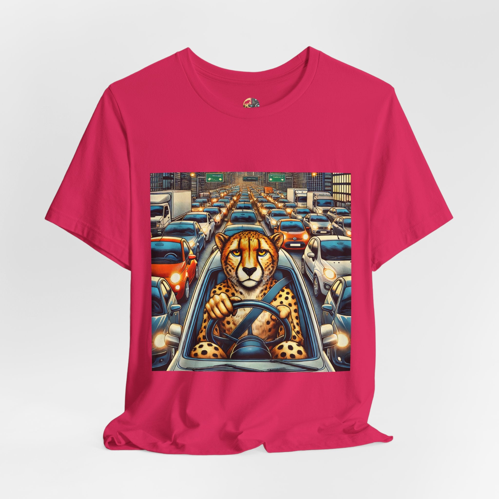 Fuchsia T-shirt featuring a graphic of a cheetah sitting in the driver’s seat of a car stuck in heavy city traffic