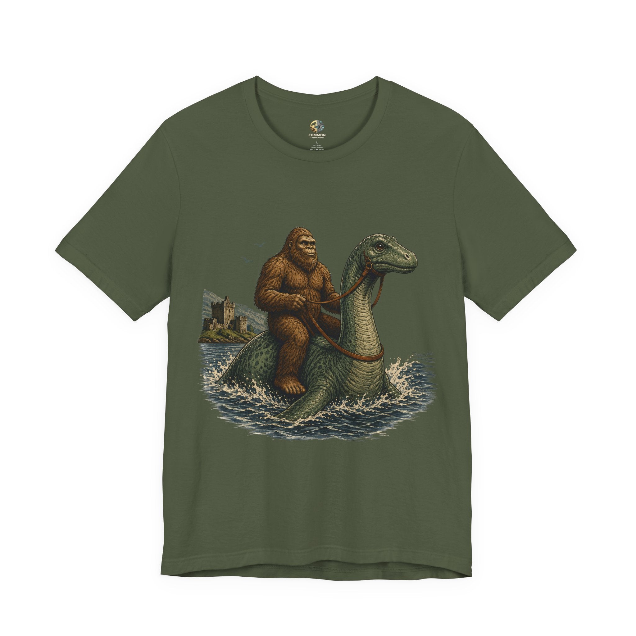 Military green t-shirt featuring bigfoot riding on the Loch Ness monster