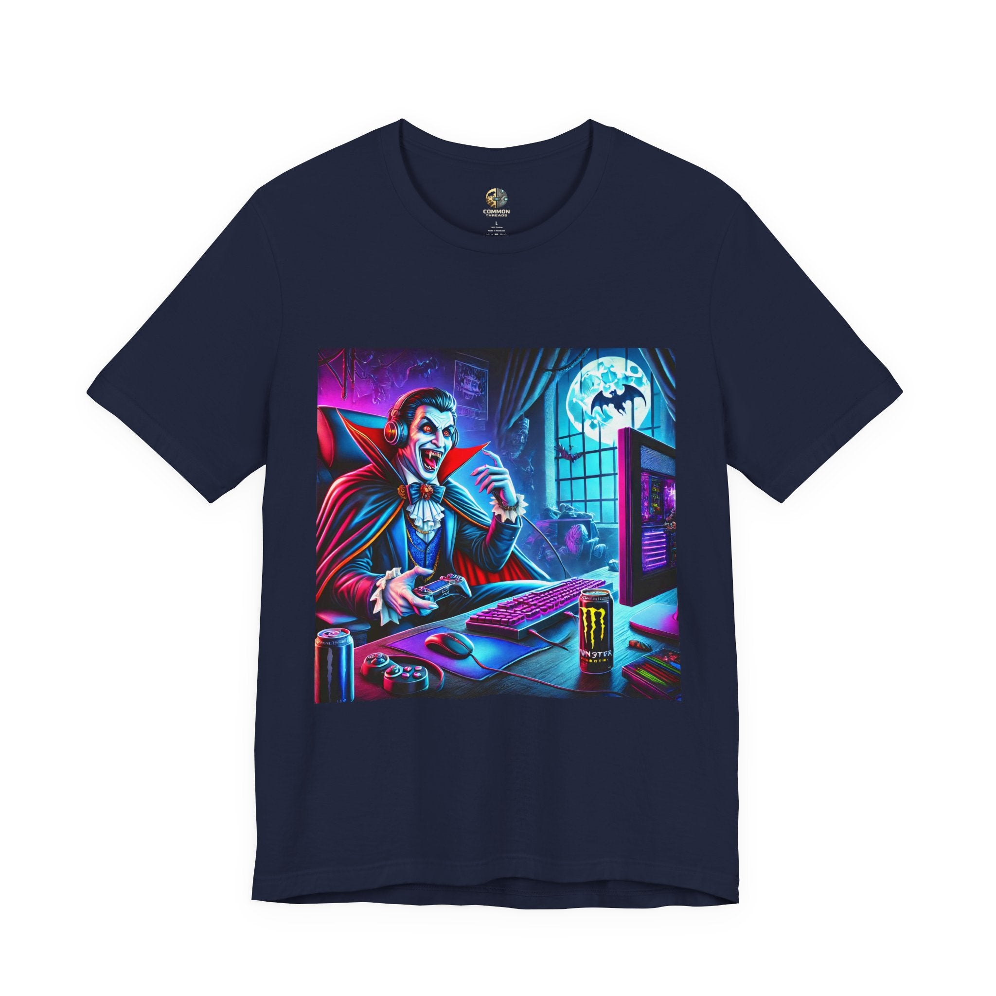 Navy blue T-shirt graphic of a classic vampire wearing a gaming headset and holding a controller at a neon-lit gaming setup under a full moon