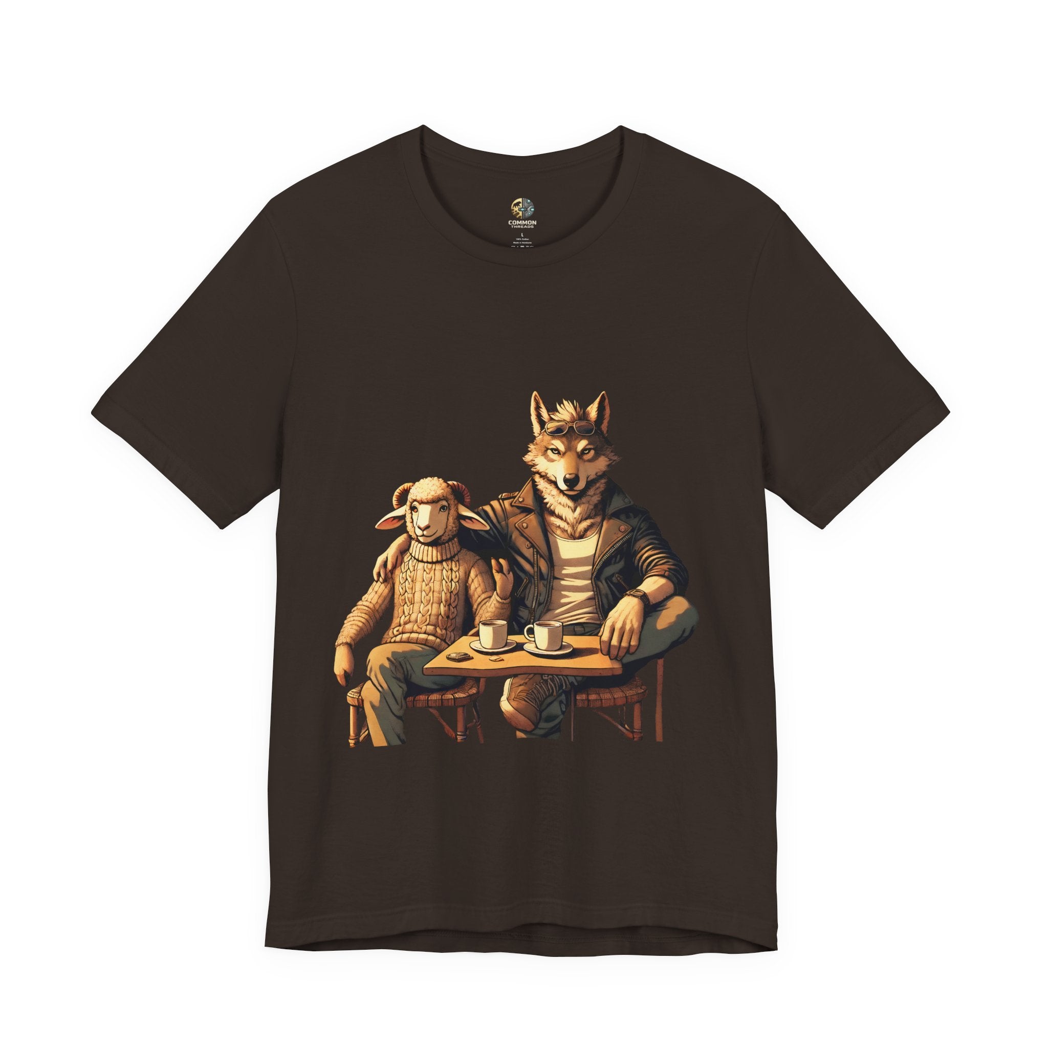 Brown T-shirt featuring an anthropomorphic wolf and lamb seated at a café table with coffee cups, illustrated in warm, painterly tones