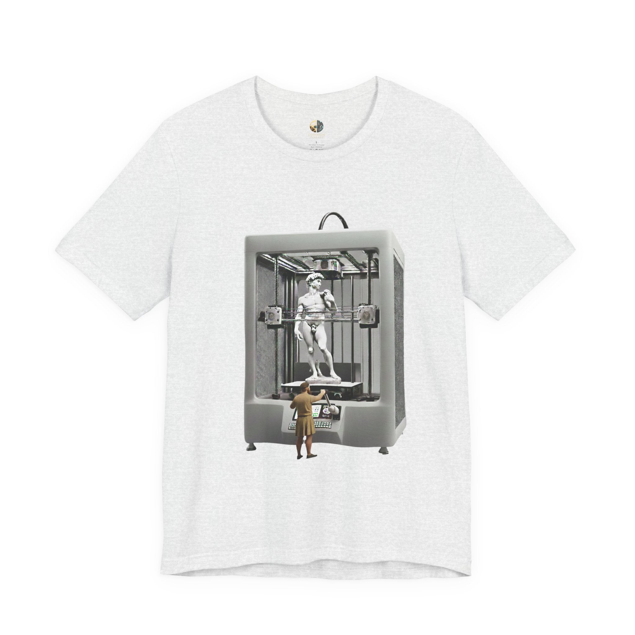 Ash color T-shirt featuring a graphic of Michelangelo’s David statue being created inside a large 3D printer, with Michelangelo standing at the controls
