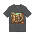 Asphalt grey T-shirt featuring an anthropomorphic wolf and lamb seated at a café table in warm, painterly style