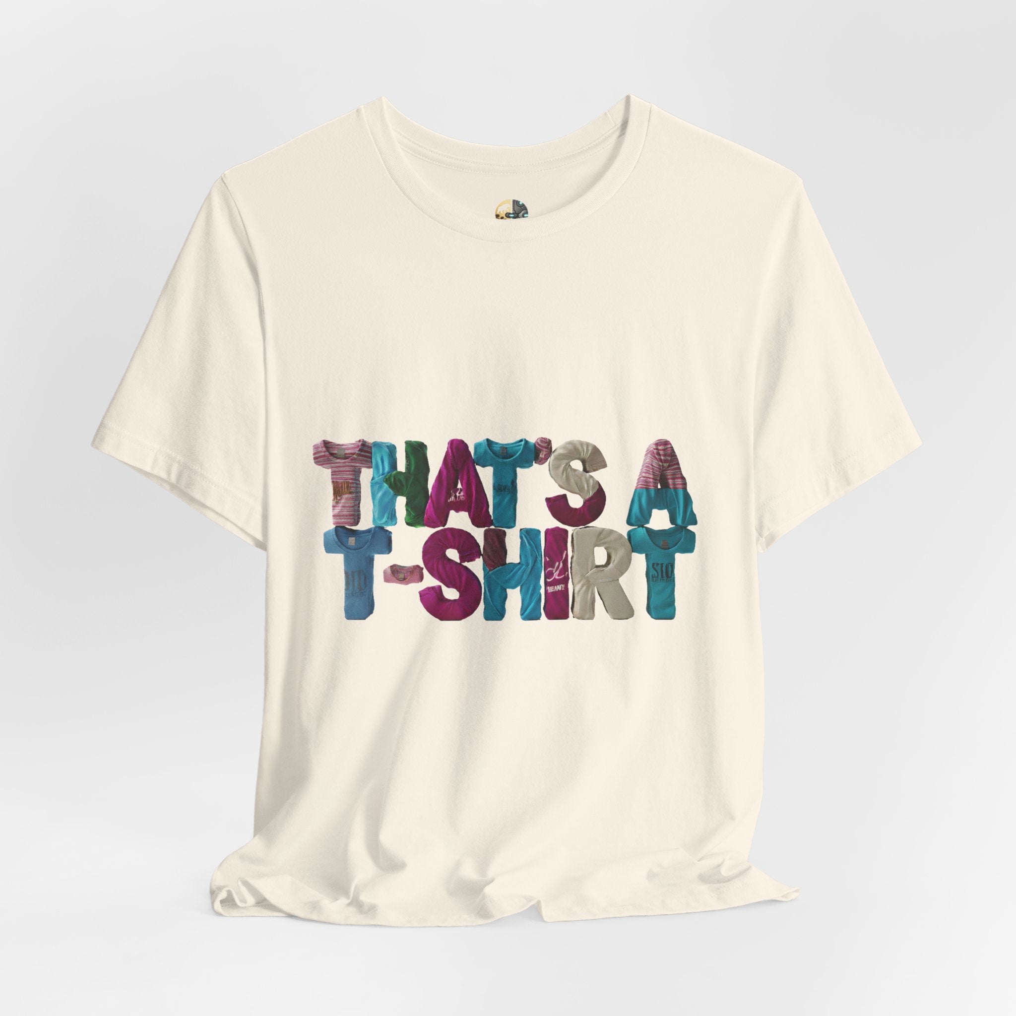 Natural color t-shirt with colorful text “THAT'S A T-SHIRT,” with each letter made from small t-shirts