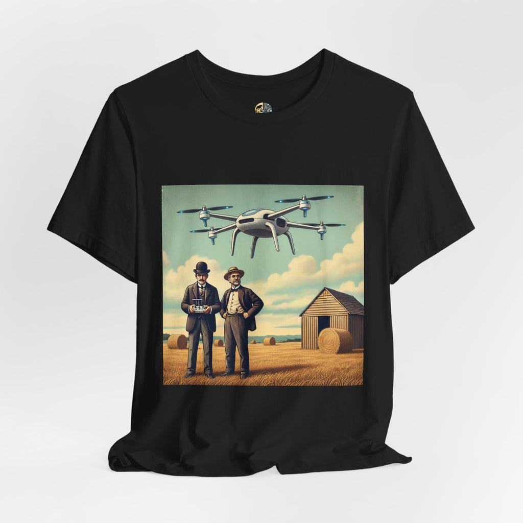 Black T-shirt featuring a graphic of the Wright brothers standing in a hayfield operating a modern quadcopter drone