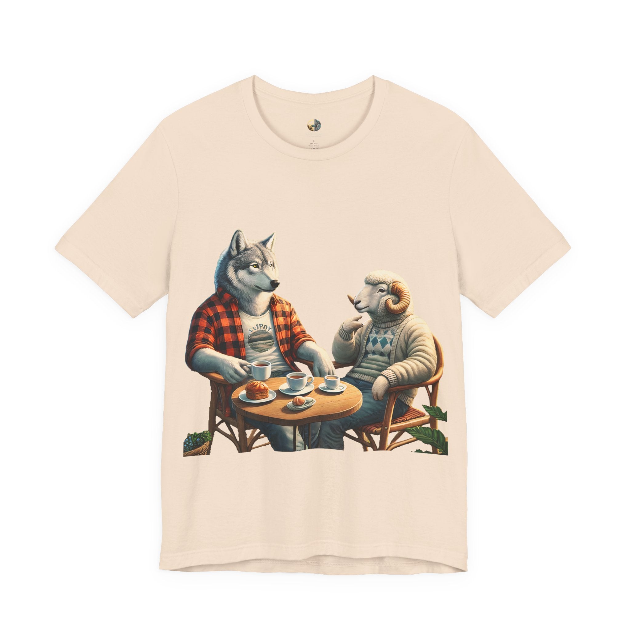 Soft creme T-shirt featuring an anthropomorphic wolf in a flannel shirt and a ram in a patterned sweater sitting at a café table with coffee