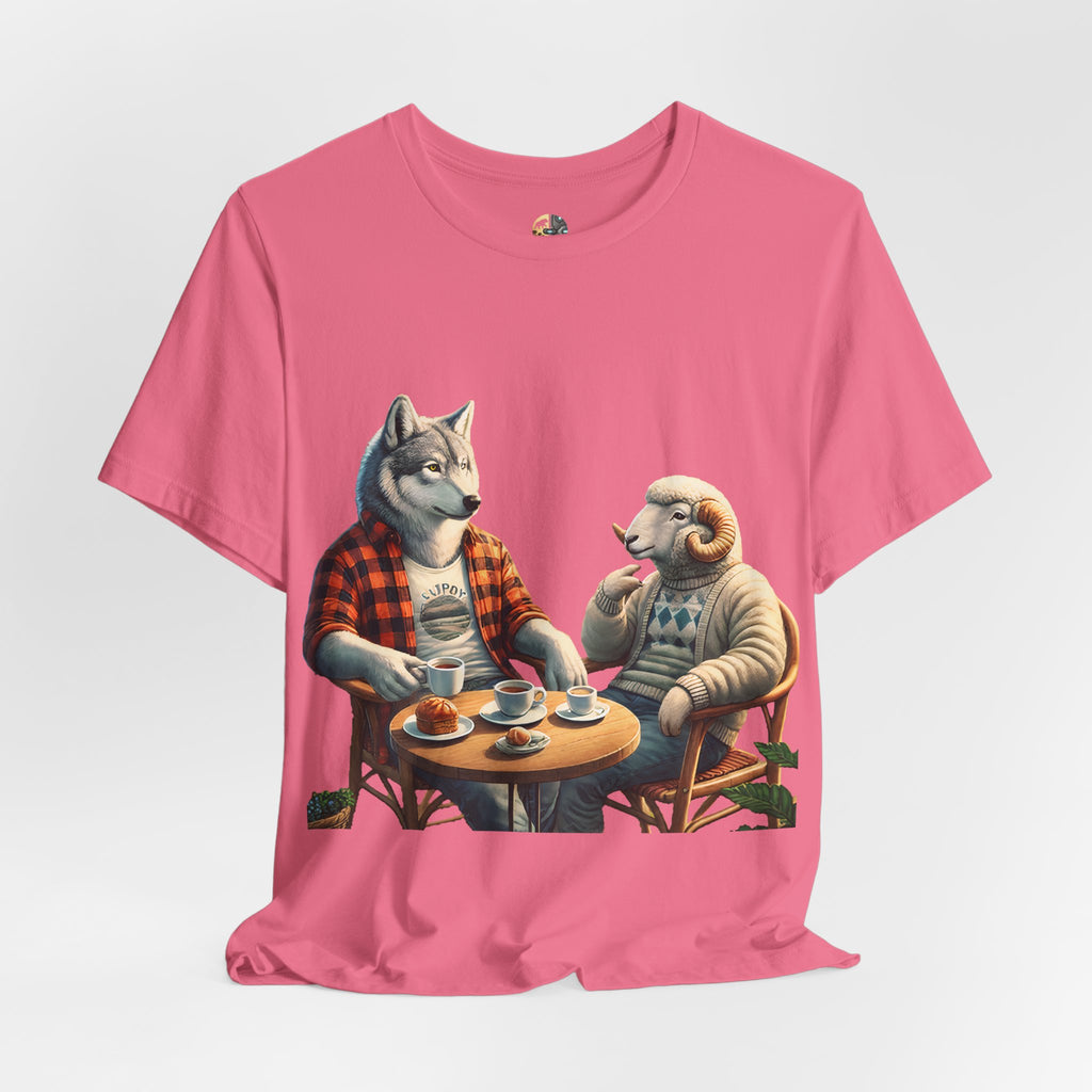 Charity pink T-shirt featuring an anthropomorphic wolf in a flannel shirt and a ram in a patterned sweater sitting at a café table with coffee