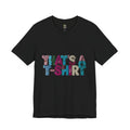 Black t-shirt with colorful text “THAT'S A T-SHIRT,” with each letter made from small t-shirts