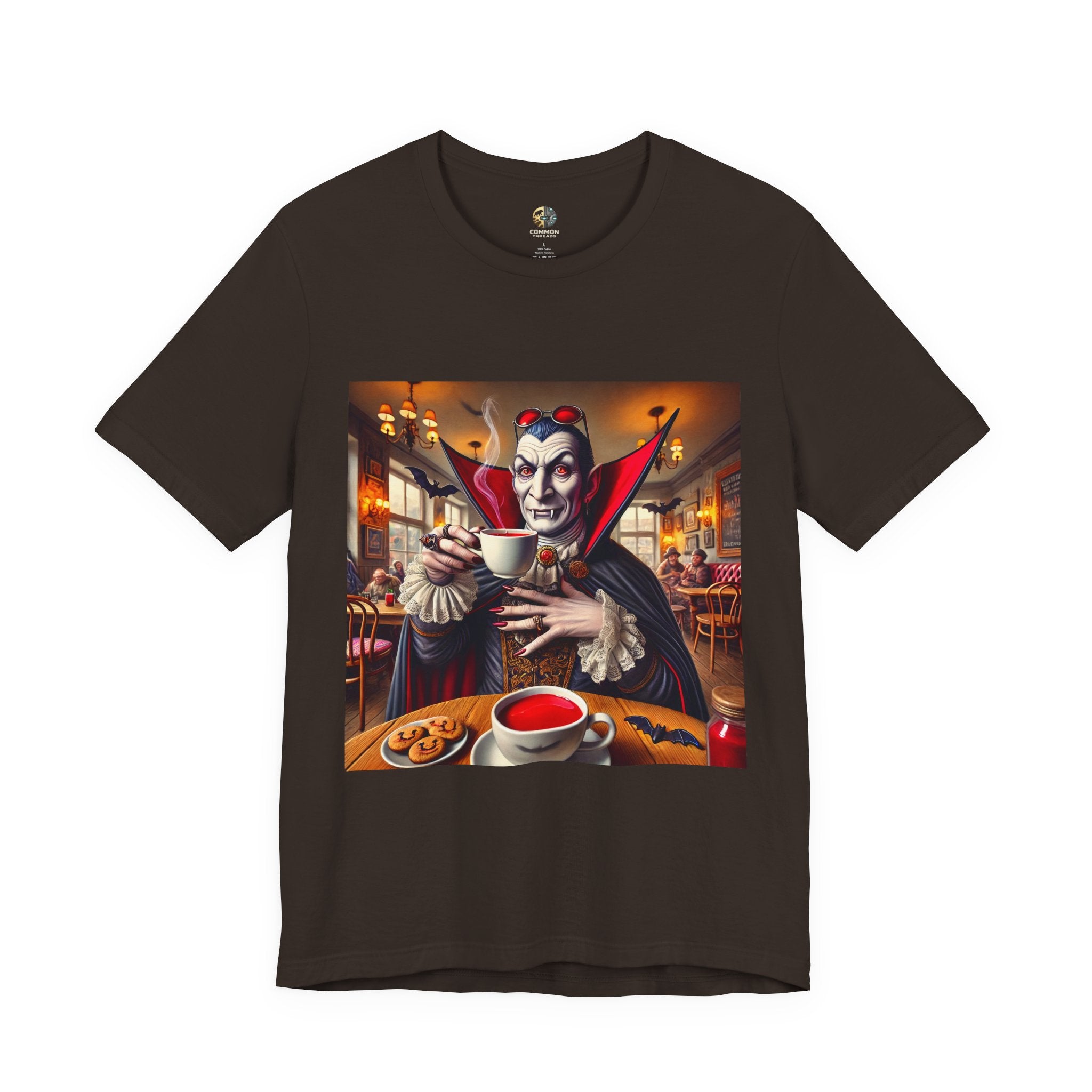 Brown T-shirt featuring a classic vampire dressed like Count Dracula sitting in a café, wearing red sunglasses and drinking from a teacup filled with red liquid