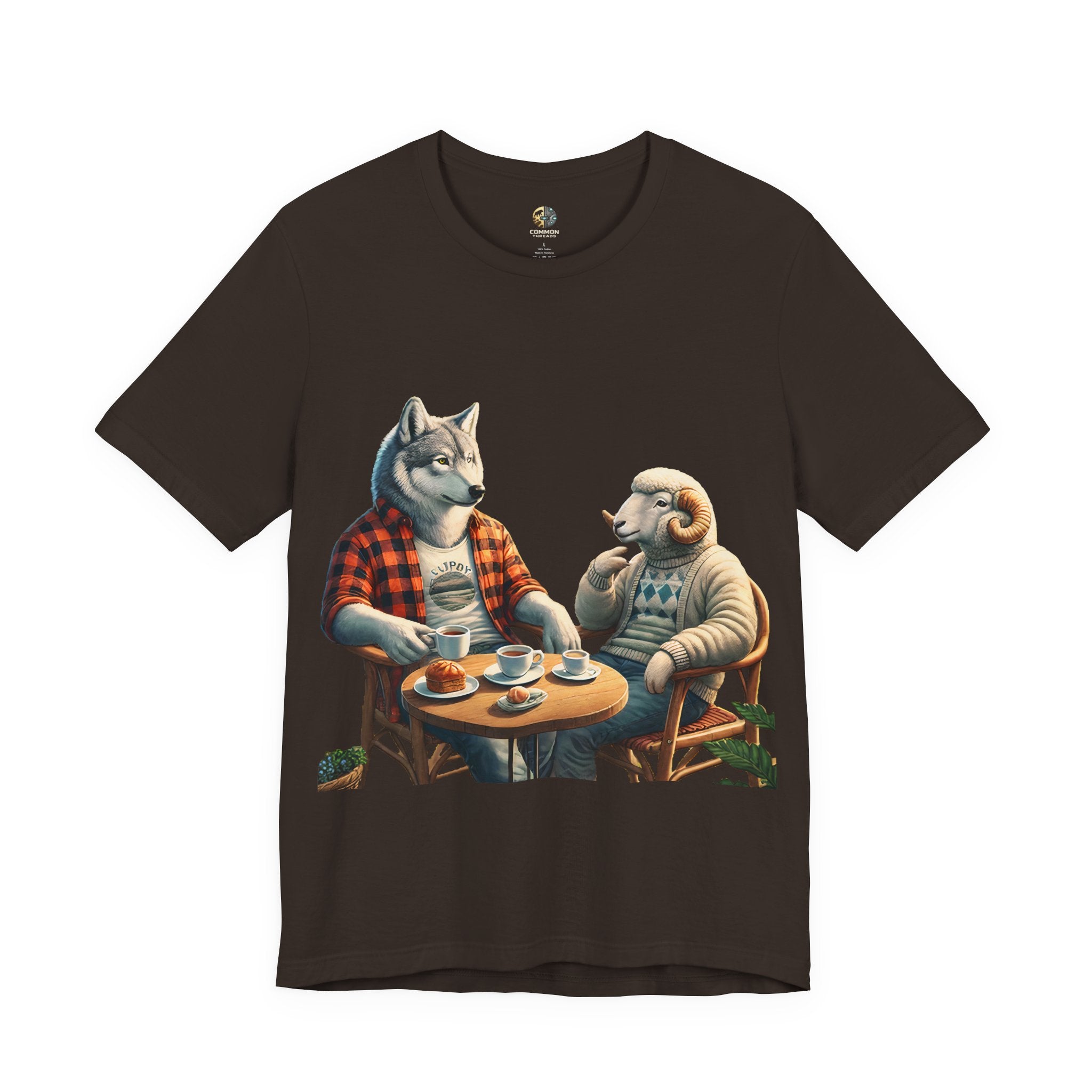 Brown T-shirt featuring an anthropomorphic wolf in a flannel shirt and a ram in a patterned sweater sitting at a café table with coffee