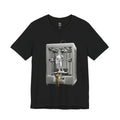 Black T-shirt featuring a graphic of Michelangelo’s David statue being created inside a large 3D printer, with Michelangelo standing at the controls