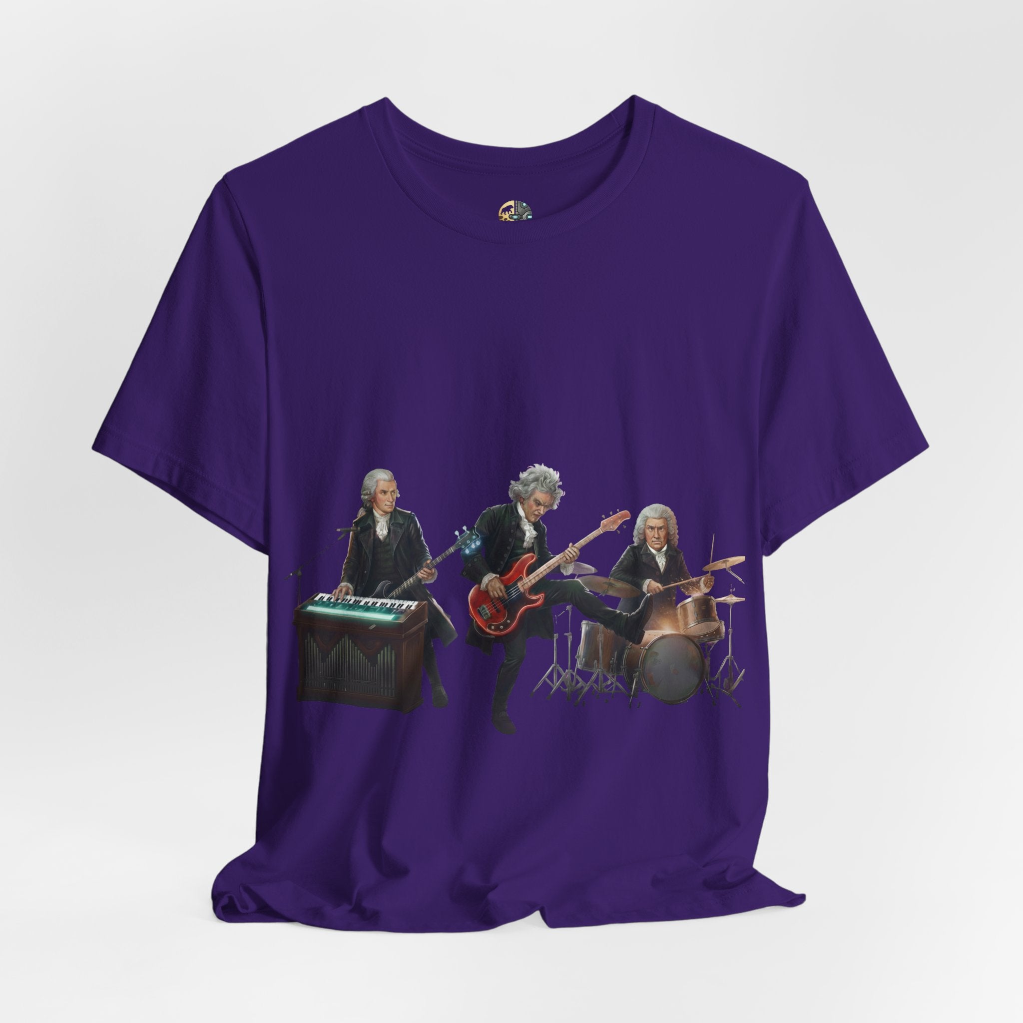 Purple t-shirt featuring Mozart on bass and keyboard, Beethoven on electric guitar, and Bach on drums in a rock band scene