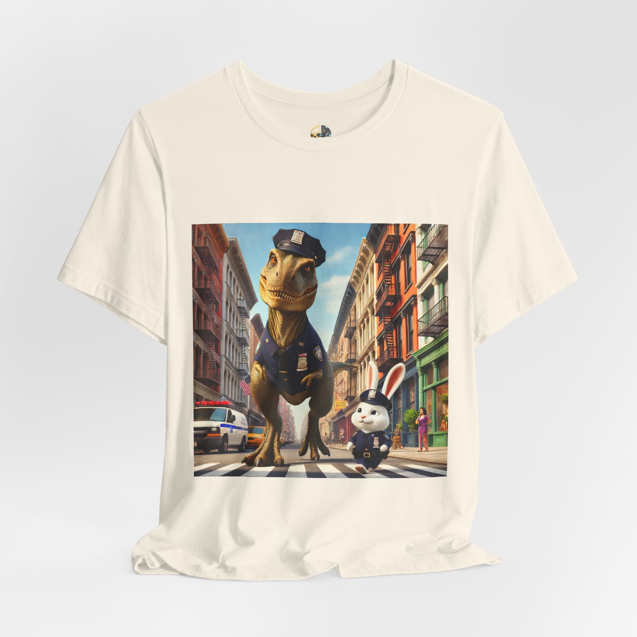 Natural color T-shirt showing a T-Rex and a bunny dressed as police officers standing together on a crosswalk in a New York–style urban setting