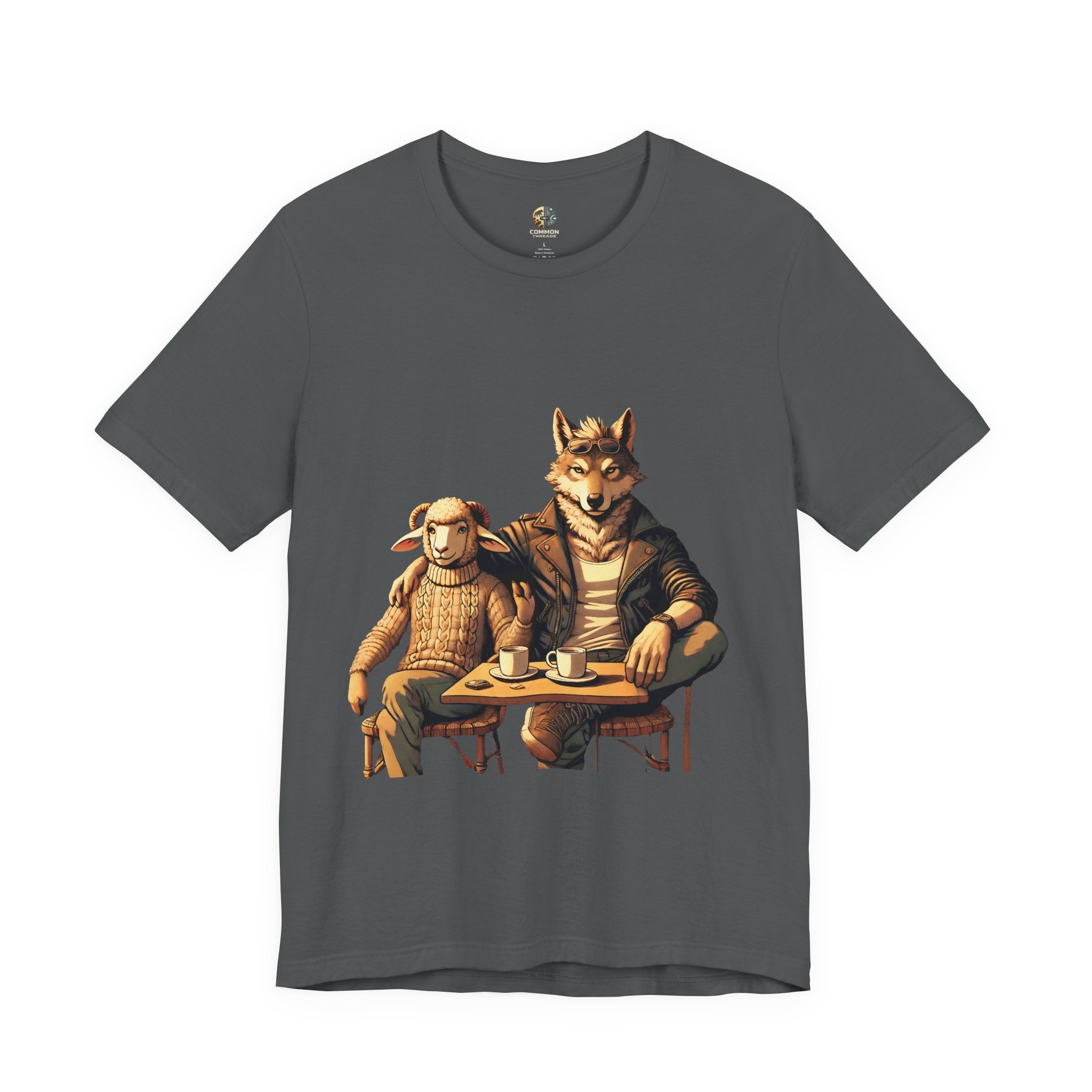 Asphalt grey T-shirt featuring an anthropomorphic wolf and lamb seated at a café table with coffee cups, illustrated in warm, painterly tones