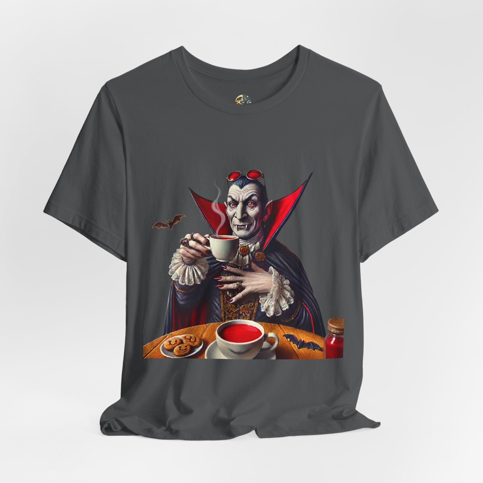 Asphalt grey T-shirt featuring a classic vampire dressed like Count Dracula sitting at a table, wearing red sunglasses and drinking from a teacup filled with red liquid
