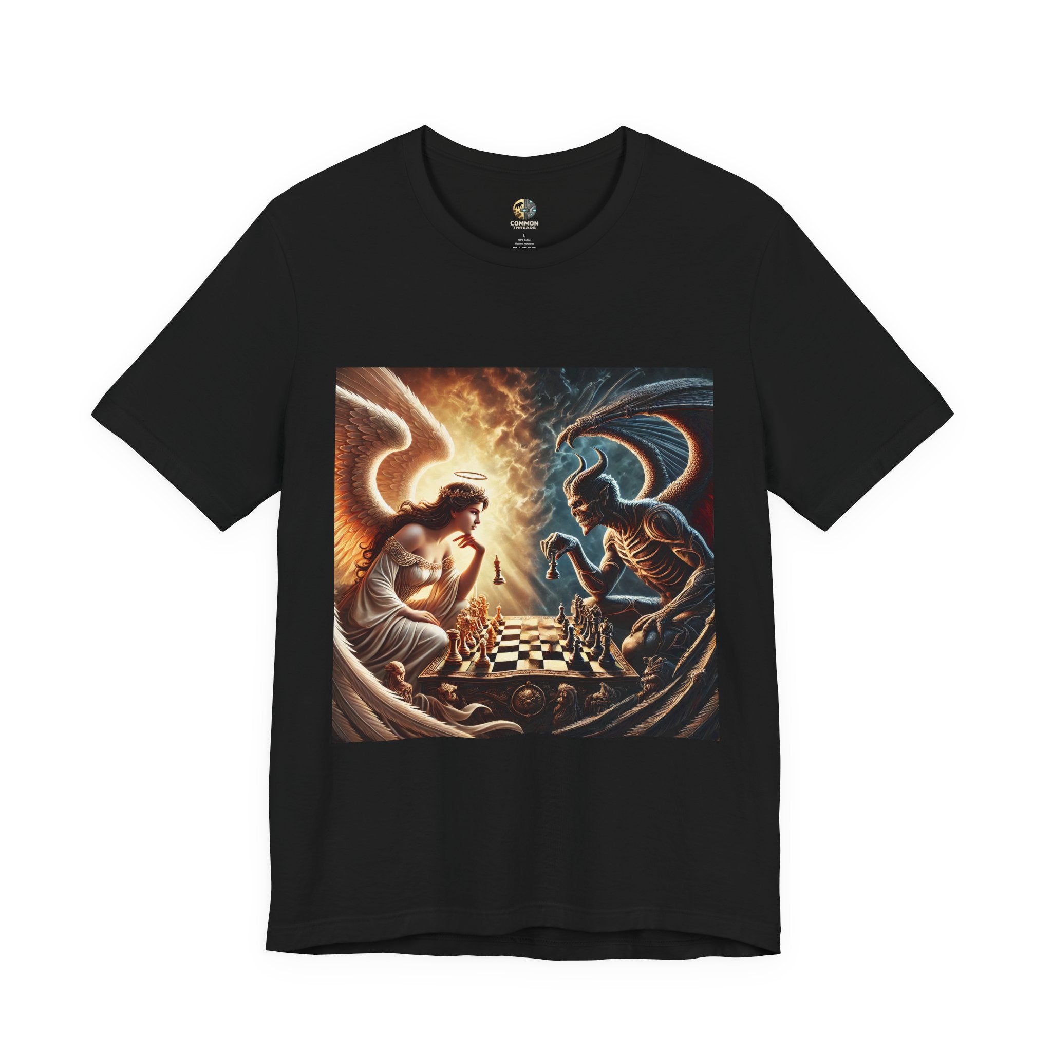 Black T-shirt featuring a graphic of an angel and a demon playing chess, with a golden king piece levitating, a dark background behind the demon and warm light tones behind the angel