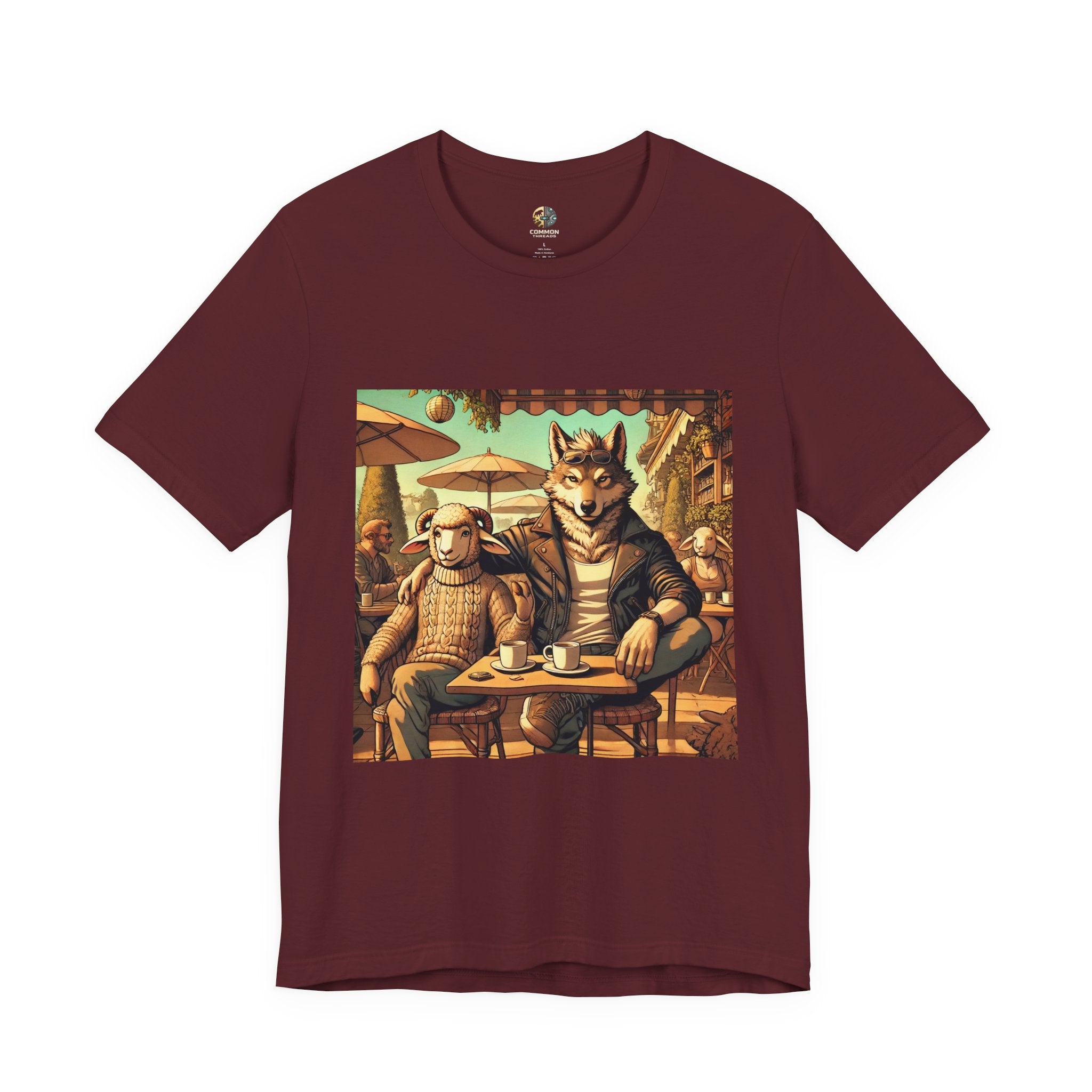 Maroon color T-shirt featuring an anthropomorphic wolf and lamb seated at a café table in warm, painterly style