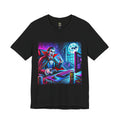 Black T-shirt graphic of a classic vampire wearing a gaming headset and holding a controller at a neon-lit gaming setup under a full moon