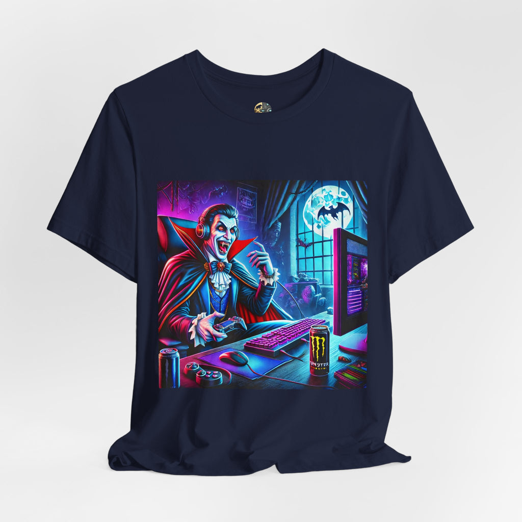 Navy blue T-shirt graphic of a classic vampire wearing a gaming headset and holding a controller at a neon-lit gaming setup under a full moon