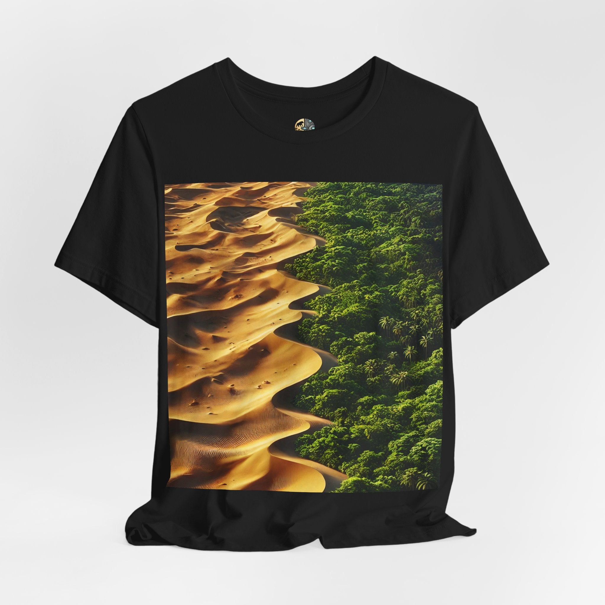 Black T-shirt featuring a split landscape with golden desert sand dunes on one side and a dense green rainforest on the other