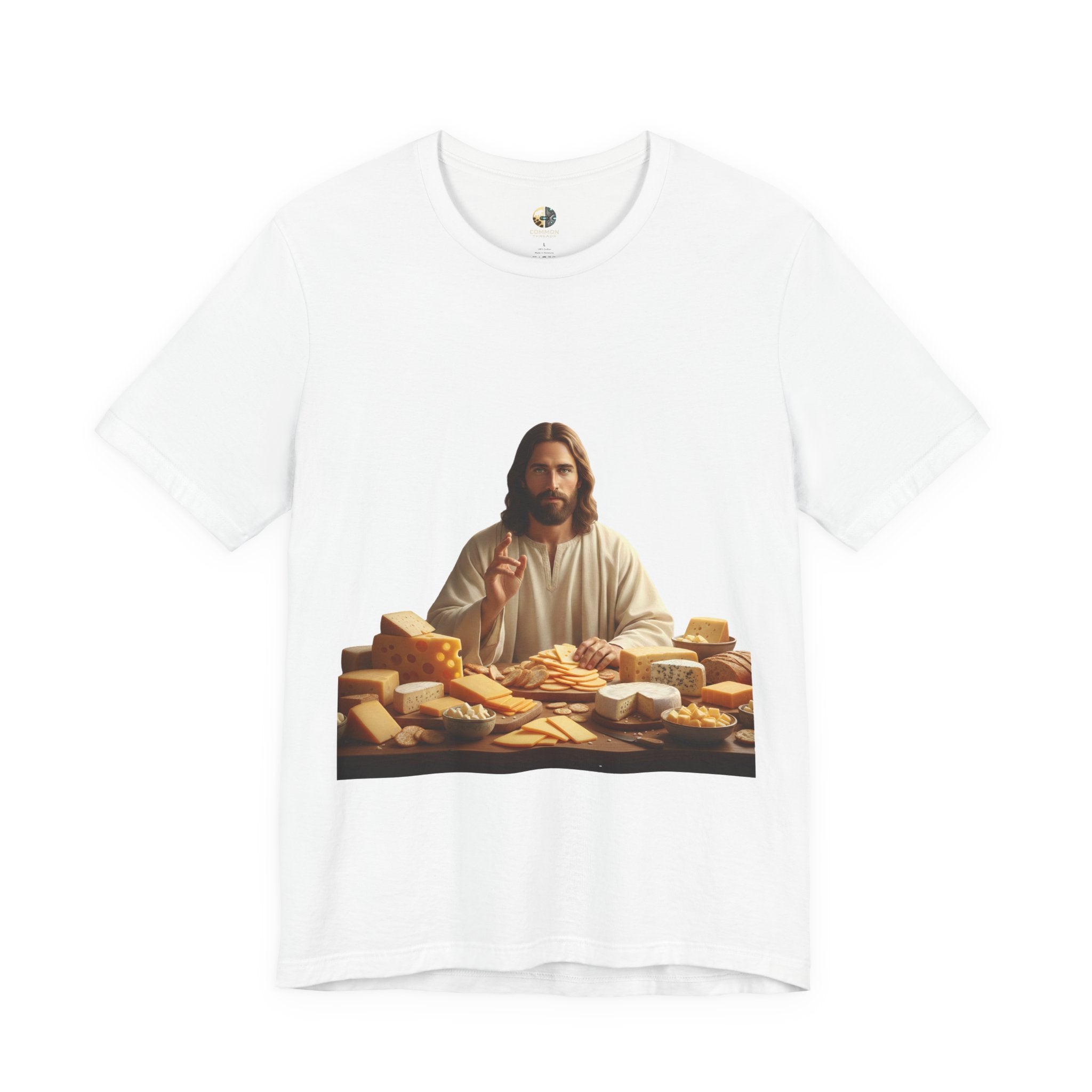 White T-shirt featuring a graphic of Jesus in traditional robes seated before a table filled with various cheeses, referencing a ‘Cheeses Sliced’ wordplay
