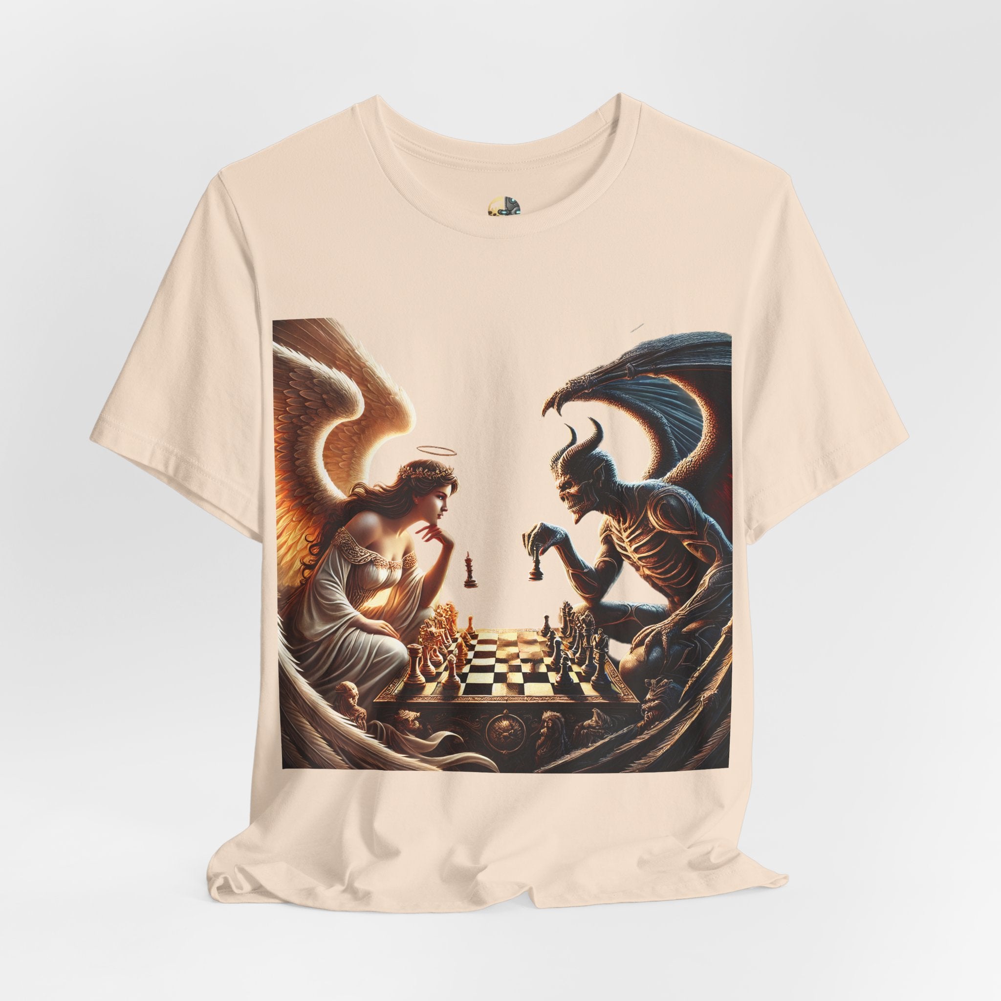Soft creme T-shirt featuring a graphic of an angel and a demon playing chess, with a golden king piece levitating