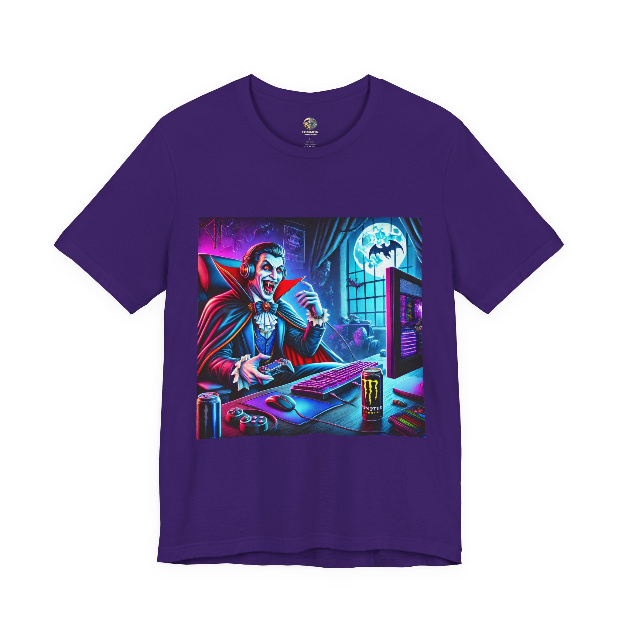 Purple T-shirt graphic of a classic vampire wearing a gaming headset and holding a controller at a neon-lit gaming setup under a full moon
