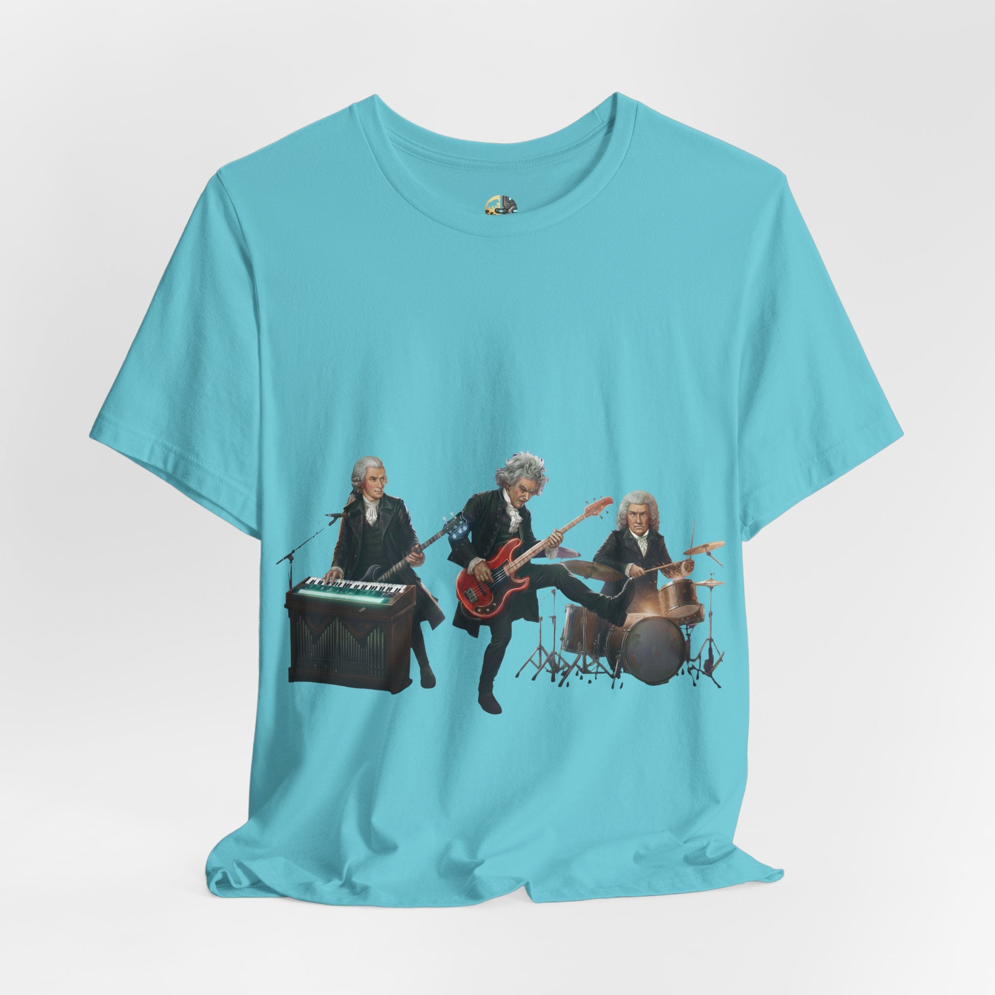 Turquoise t-shirt featuring Mozart on bass and keyboard, Beethoven on electric guitar, and Bach on drums in a rock band scene
