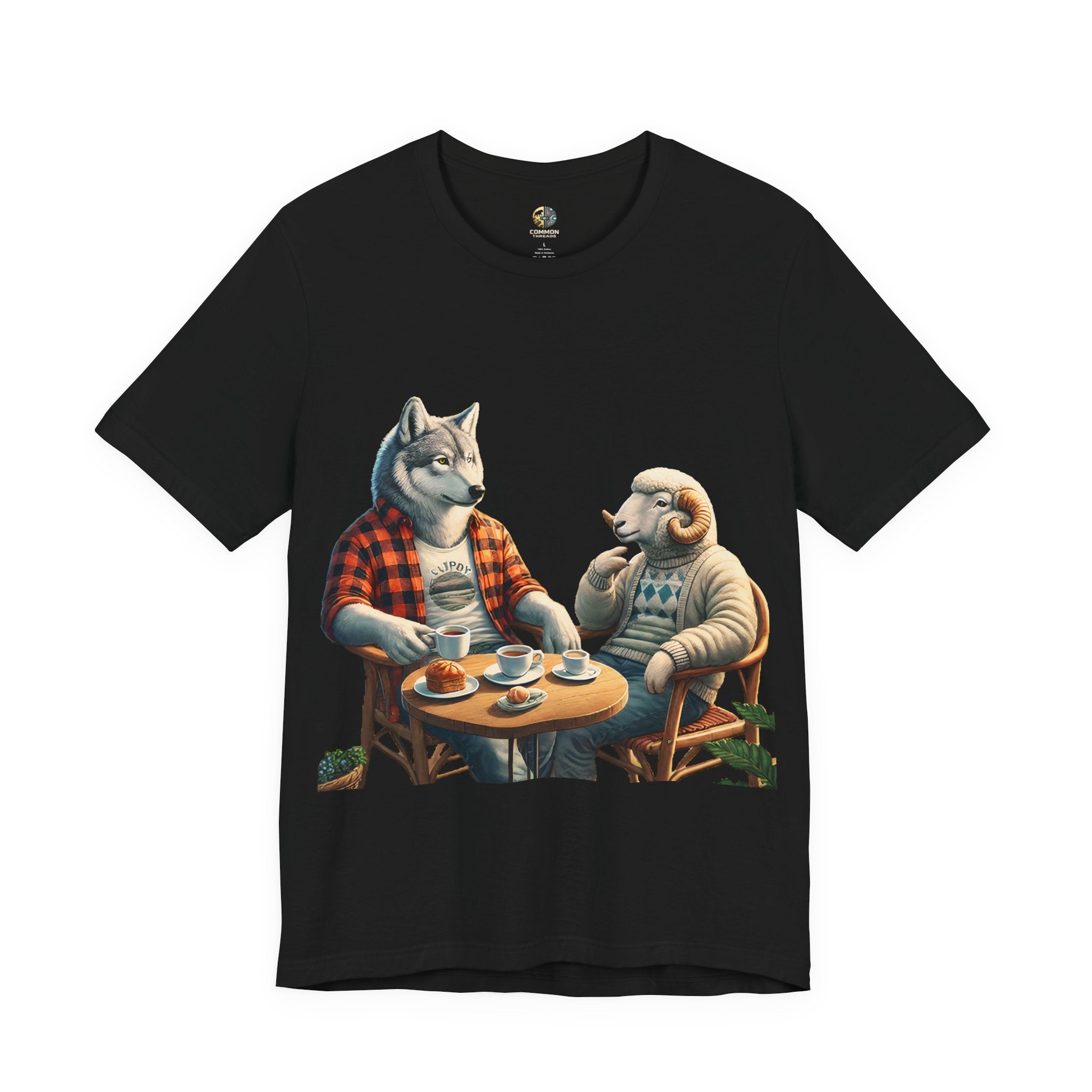 Black T-shirt featuring an anthropomorphic wolf in a flannel shirt and a ram in a patterned sweater sitting at a café table with coffee