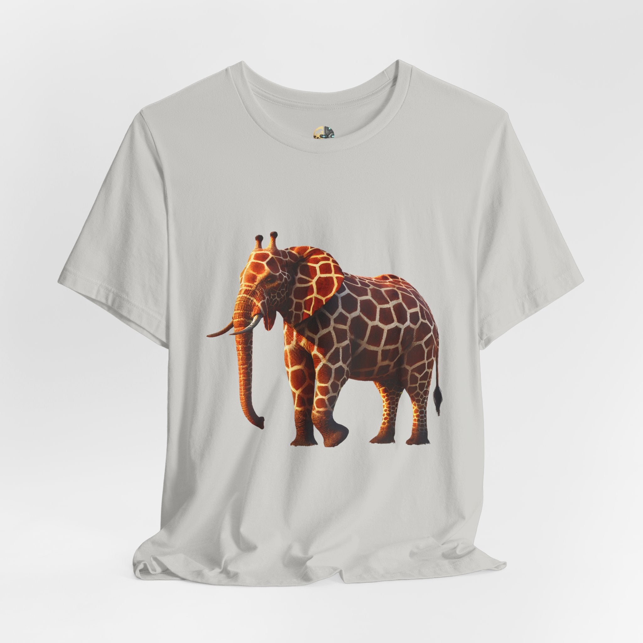 Silver T-shirt featuring an elephant–giraffe hybrid with giraffe patterns and small ossicones.