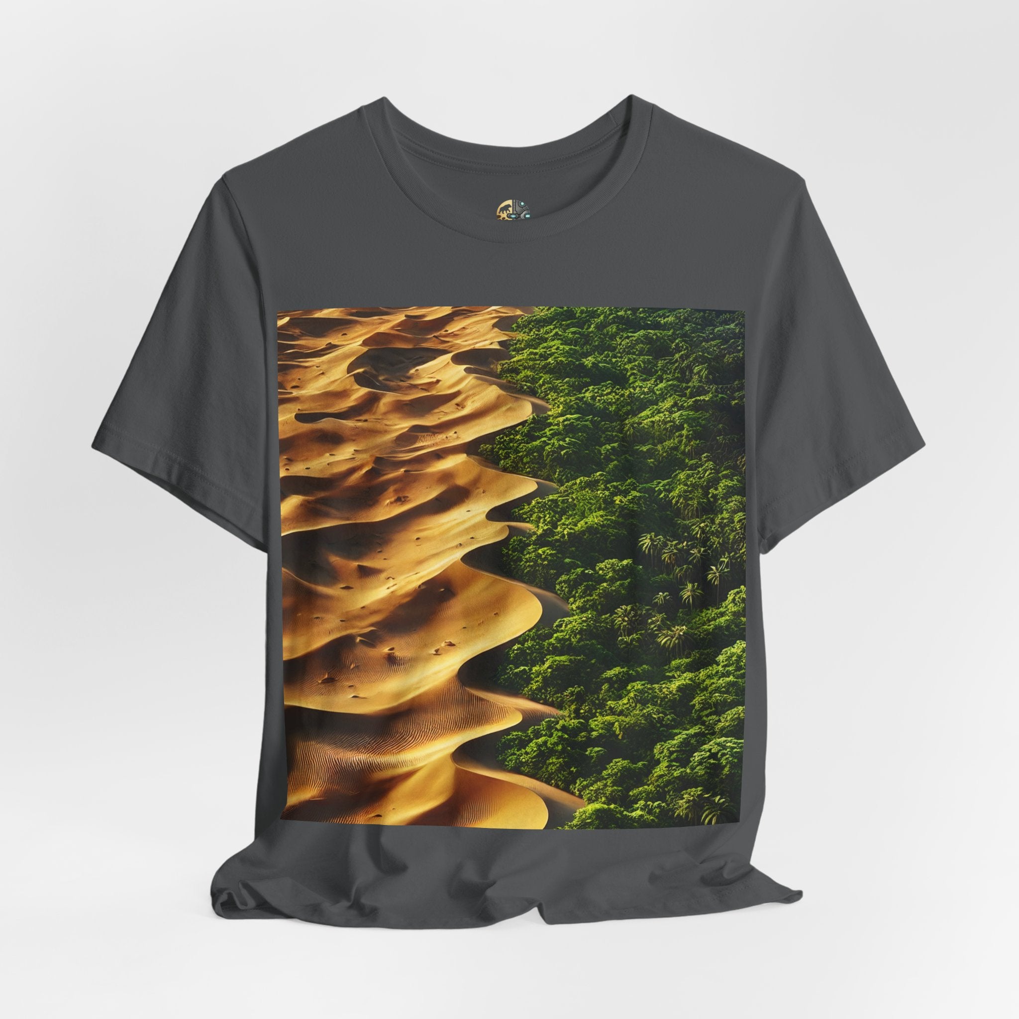Asphalt grey T-shirt featuring a split landscape with golden desert sand dunes on one side and a dense green rainforest on the other