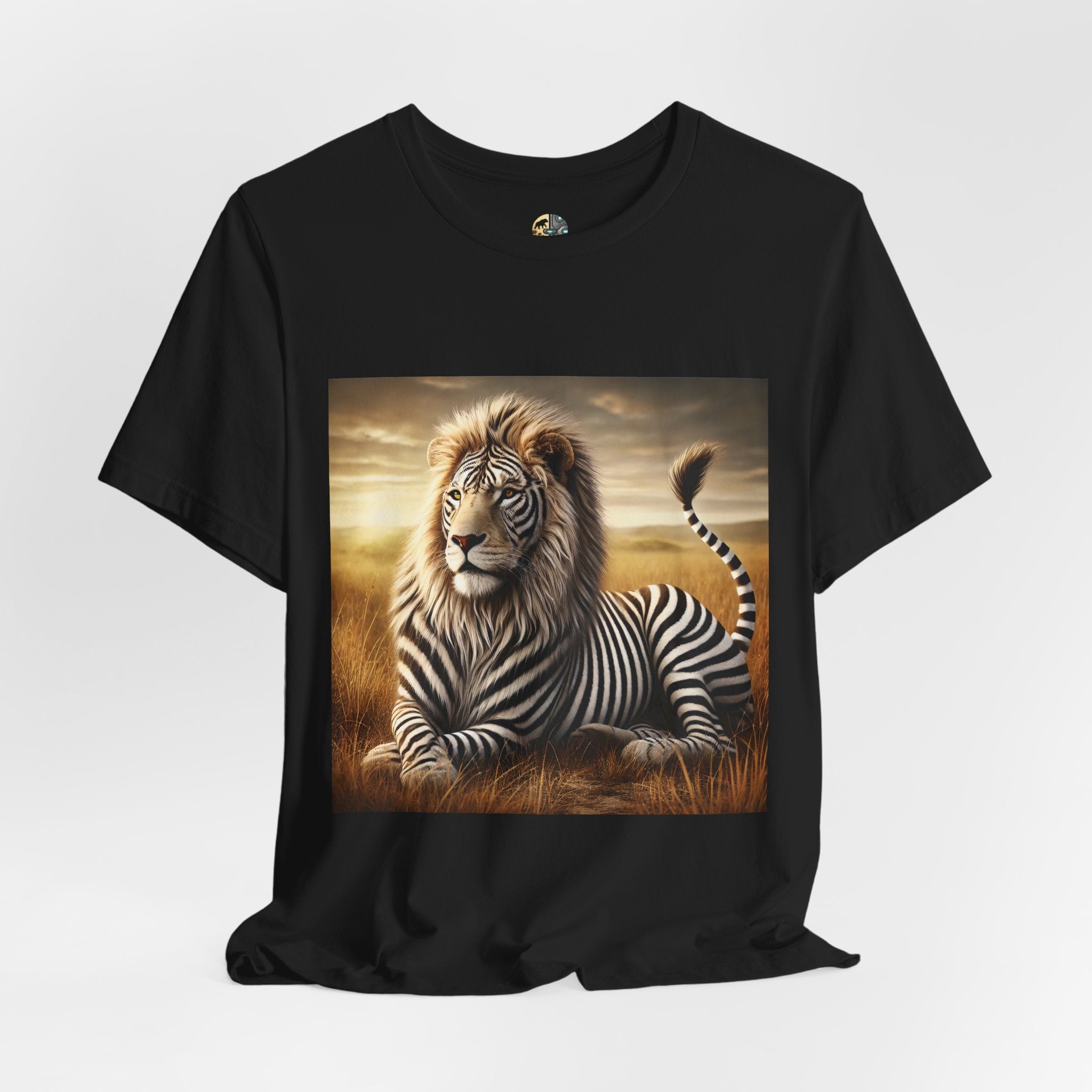 Black T-shirt featuring a lion with distinctive zebra-like stripes lying on dry savanna grass under a clear sky
