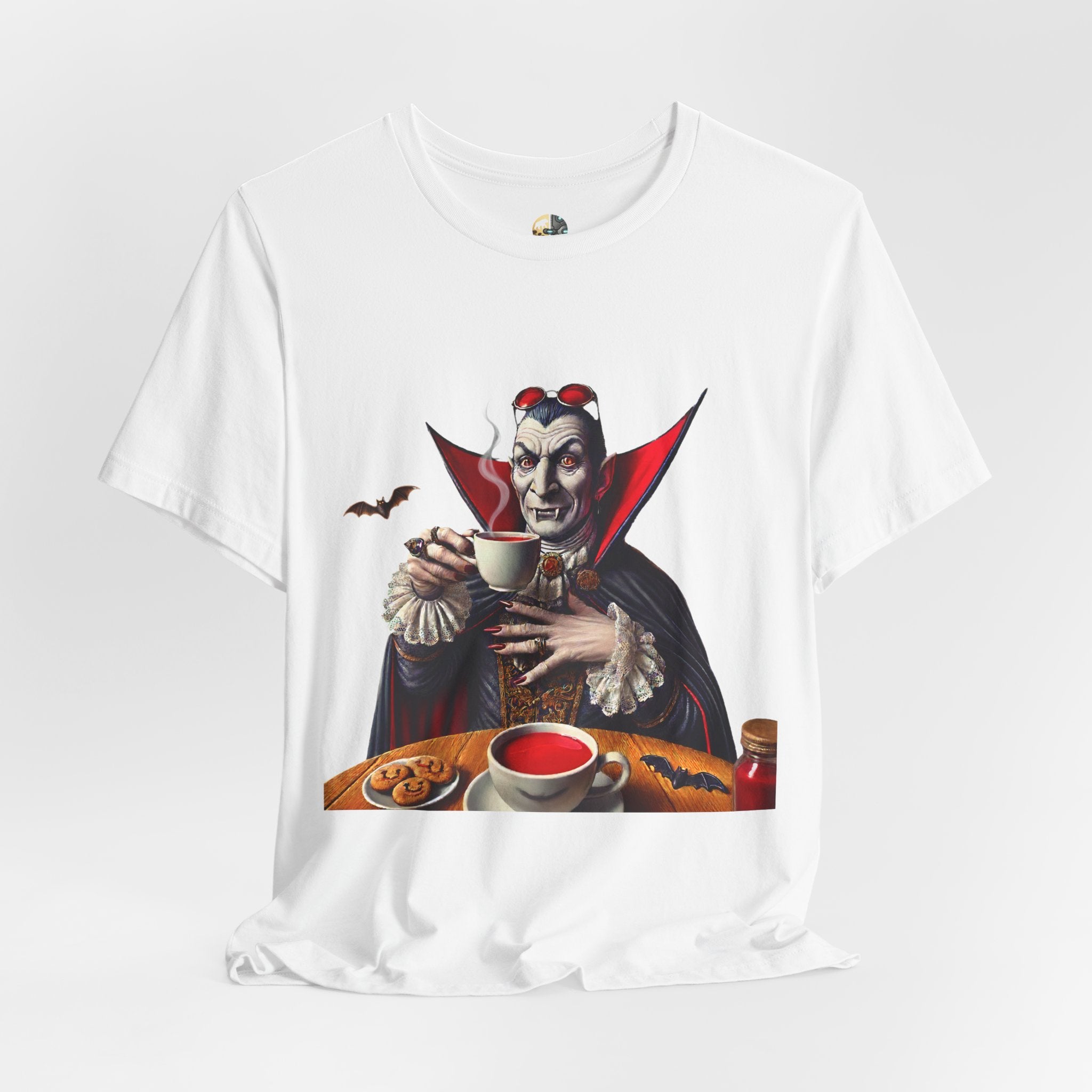 White T-shirt featuring a classic vampire dressed like Count Dracula sitting in a café, wearing red sunglasses and drinking from a teacup filled with red liquid