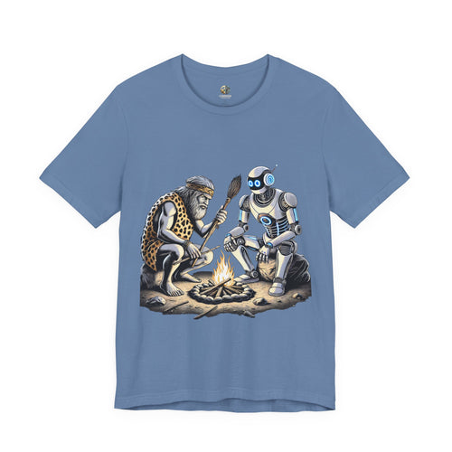 Lavender blue T-shirt featuring a graphic of a bearded caveman in a leopard-print pelt sitting by a campfire with a futuristic robot