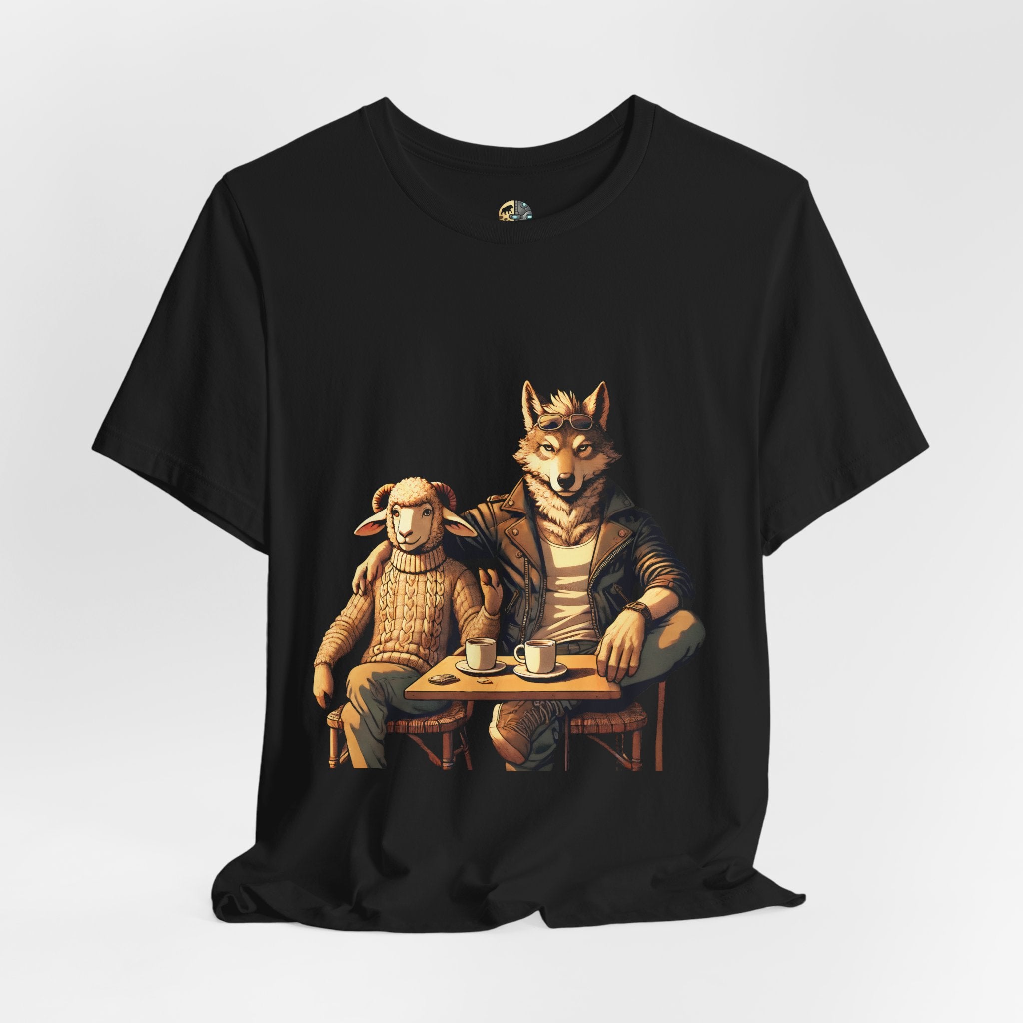 Black T-shirt featuring an anthropomorphic wolf and lamb seated at a café table with coffee cups, illustrated in warm, painterly tones