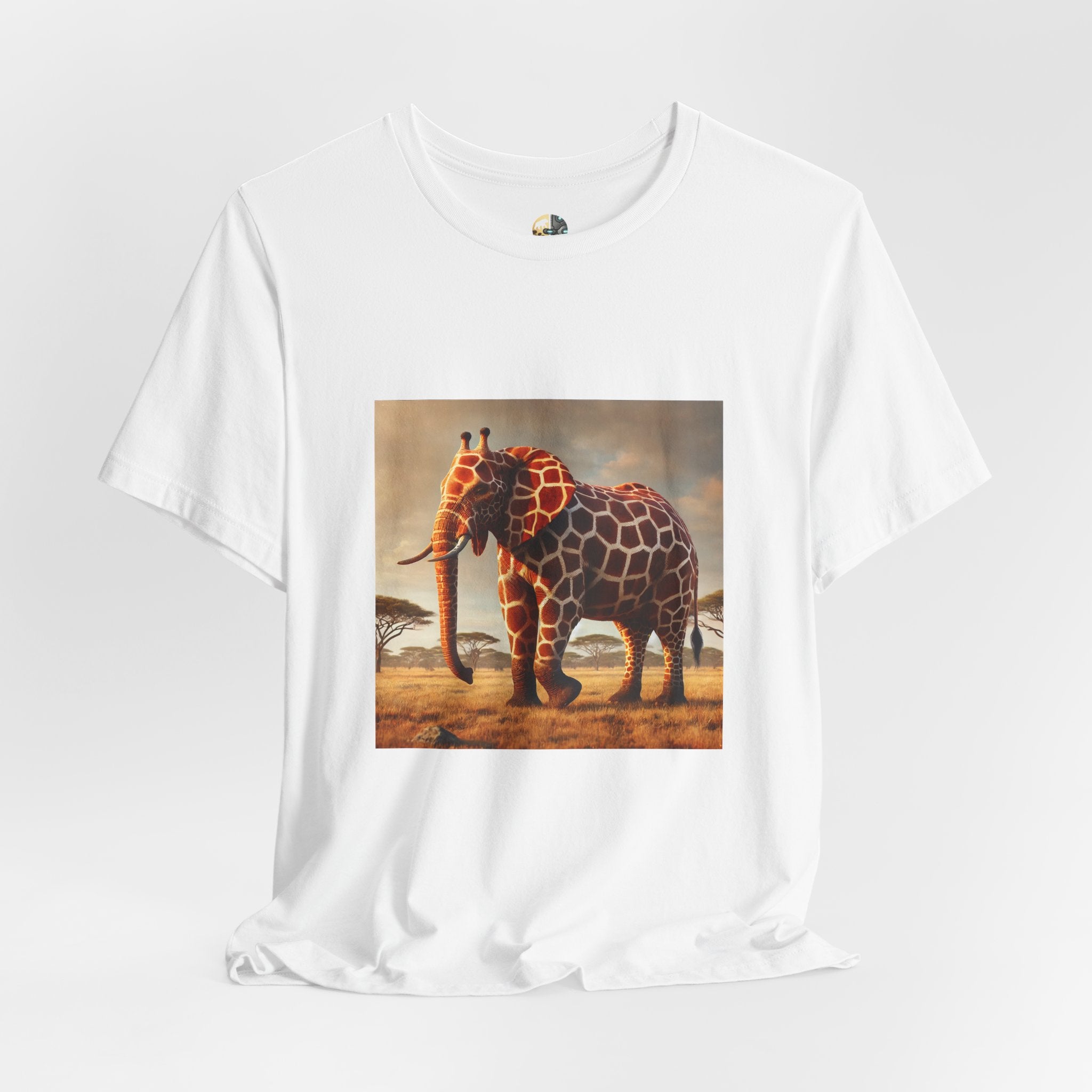 White T-shirt featuring a graphic of an elephant–giraffe hybrid with giraffe patterns and small ossicones, set against a savanna background