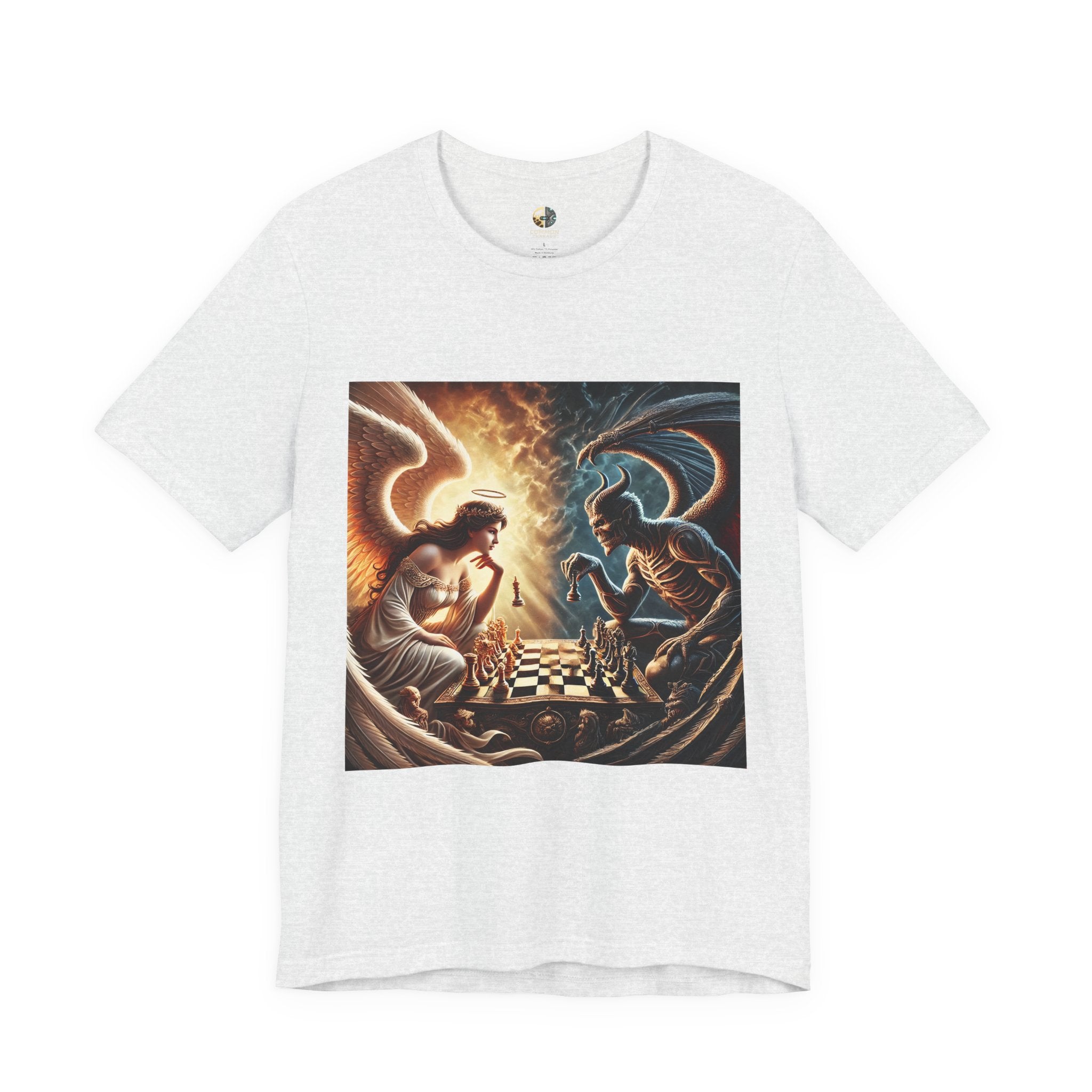 Ash color T-shirt featuring a graphic of an angel and a demon playing chess, with a golden king piece levitating, a dark background behind the demon and warm light tones behind the angel