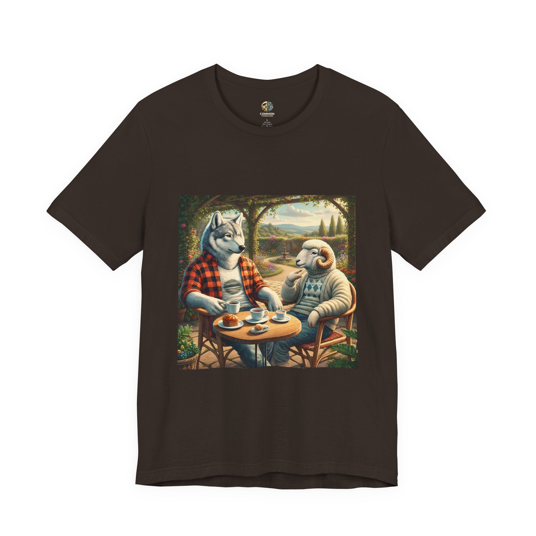 Brown T-shirt featuring a graphic of a wolf in a flannel shirt and a ram in a patterned sweater sitting at a café table drinking coffee on a porch
