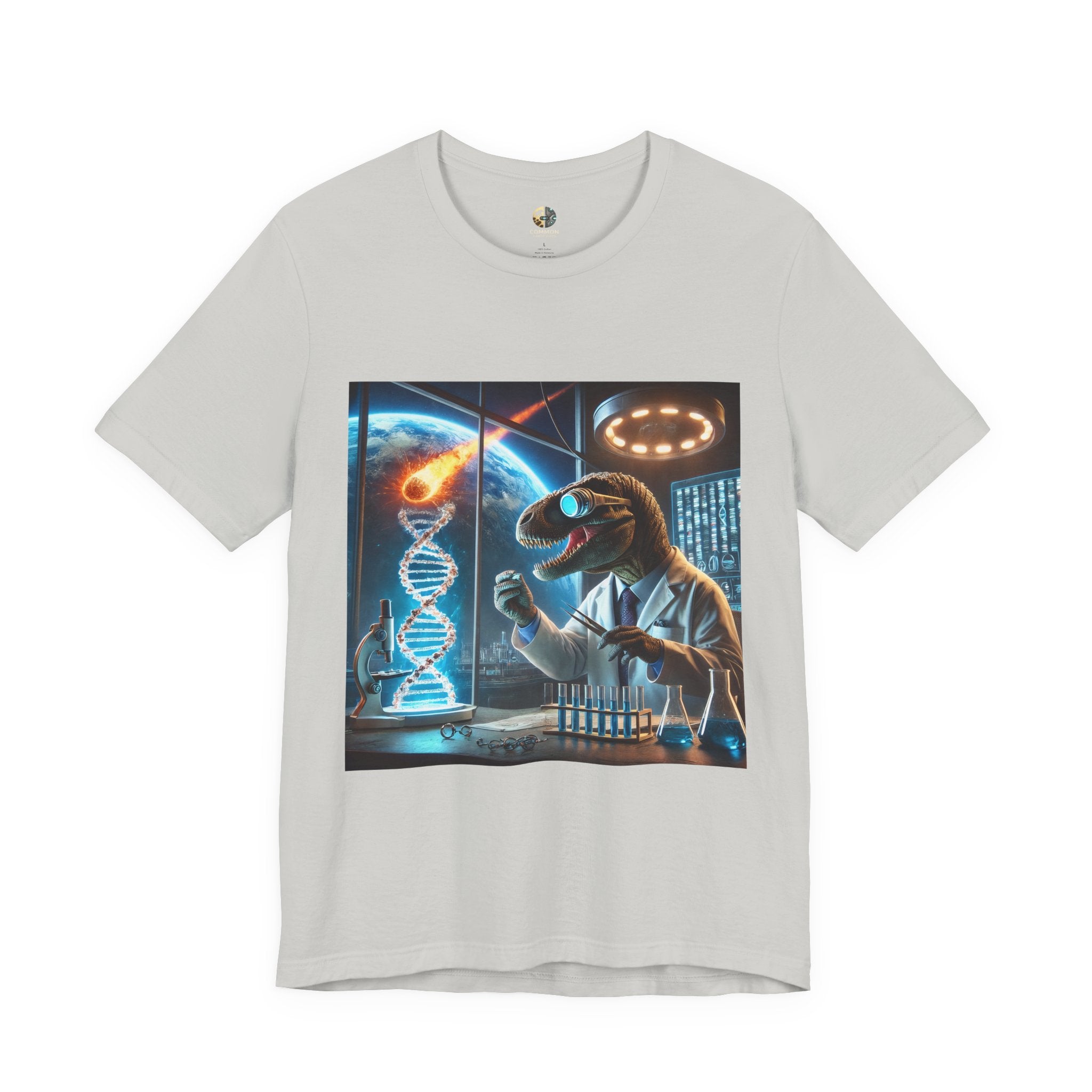 Silver t-shirt featuring a dinosaur in a space lab conducting experiments, with Earth visible outside being hit by a meteor