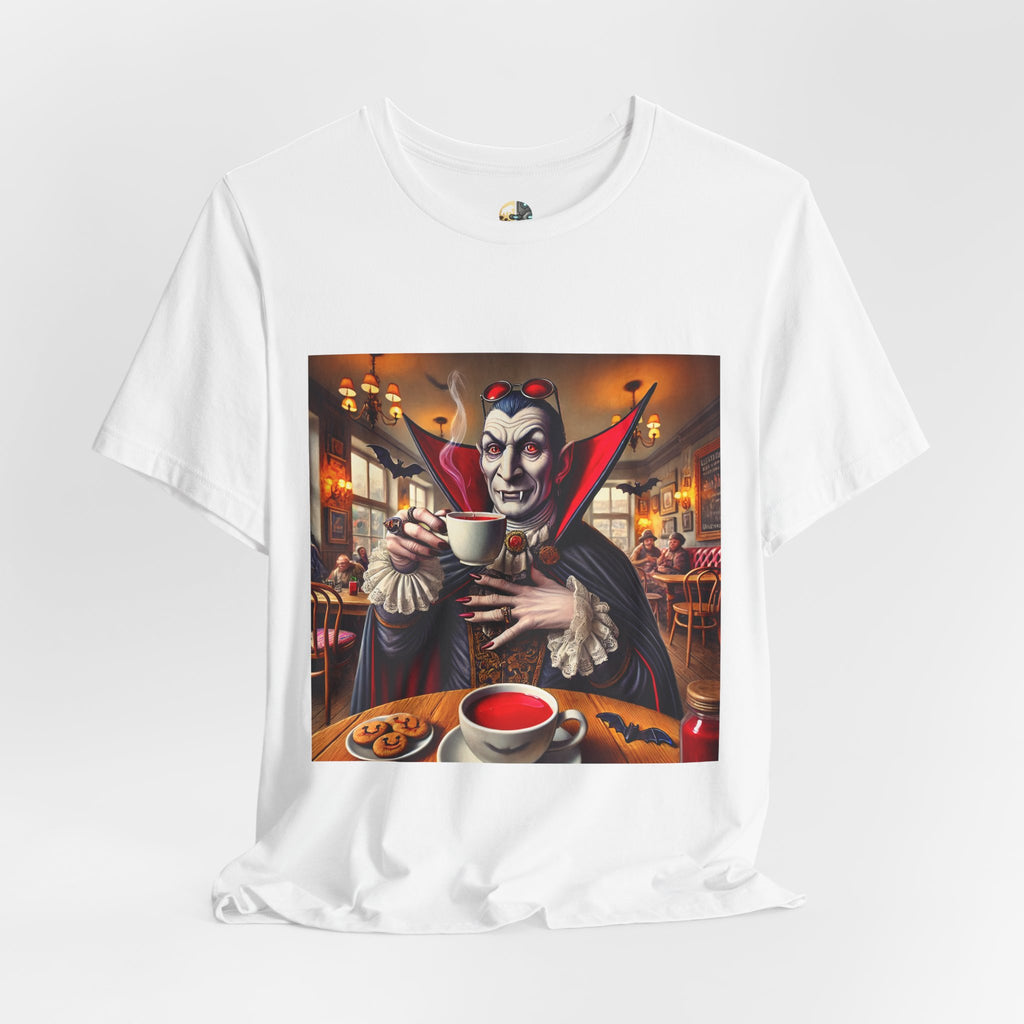 White T-shirt featuring a classic vampire dressed like Count Dracula sitting in a café, wearing red sunglasses and drinking from a teacup filled with red liquid
