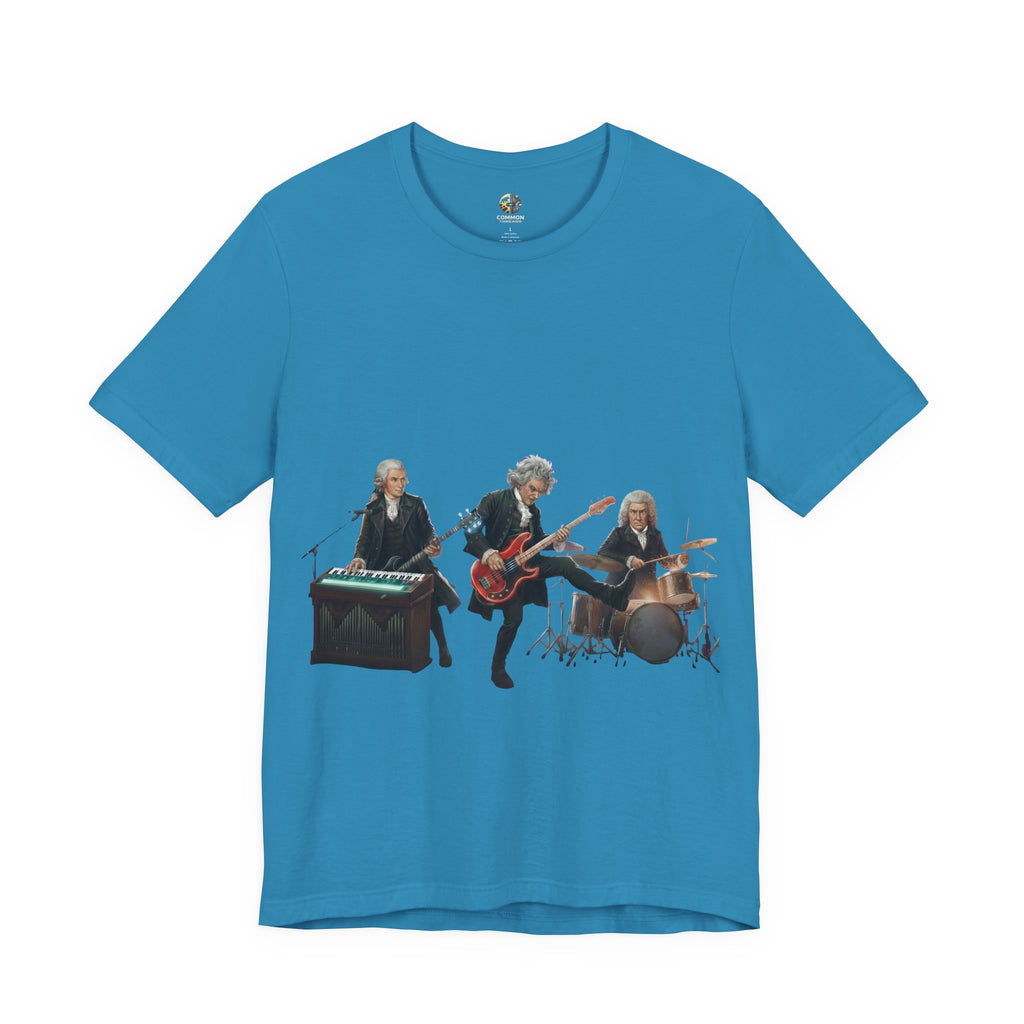 Aqua blue t-shirt featuring Mozart on bass and keyboard, Beethoven on electric guitar, and Bach on drums in a rock band scene