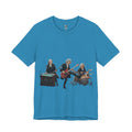 Aqua blue t-shirt featuring Mozart on bass and keyboard, Beethoven on electric guitar, and Bach on drums in a rock band scene