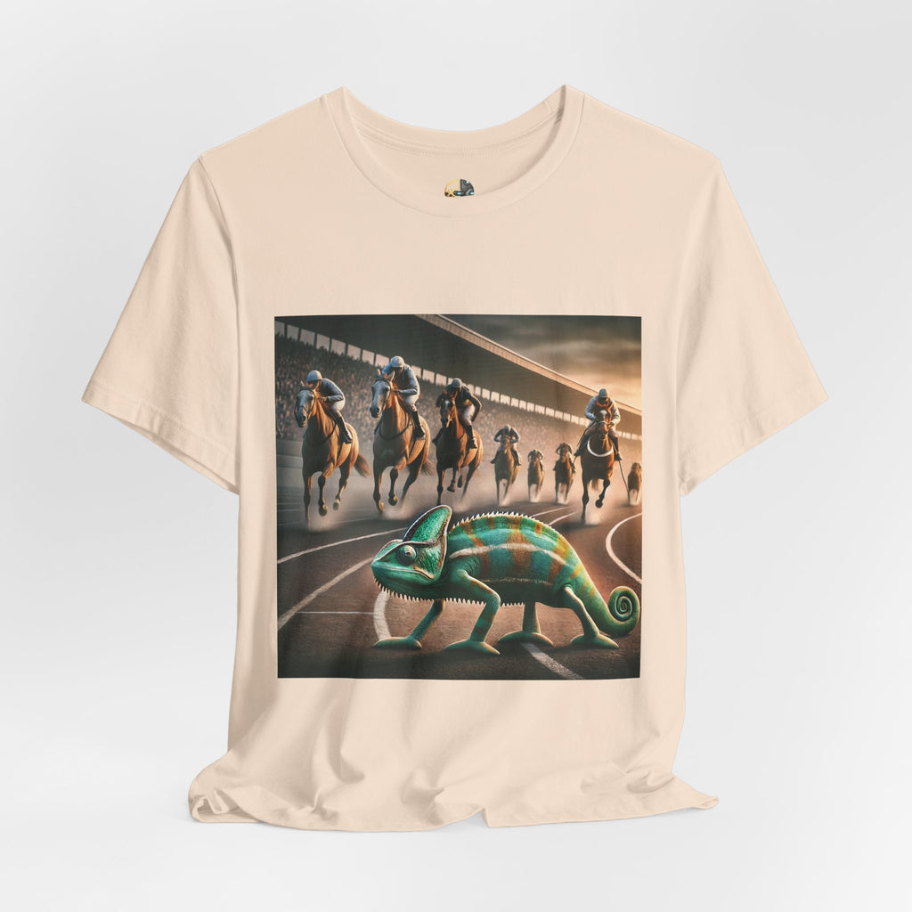 Soft creme T-shirt featuring a chameleon on a racetrack with a pack of racehorses approaching from behind