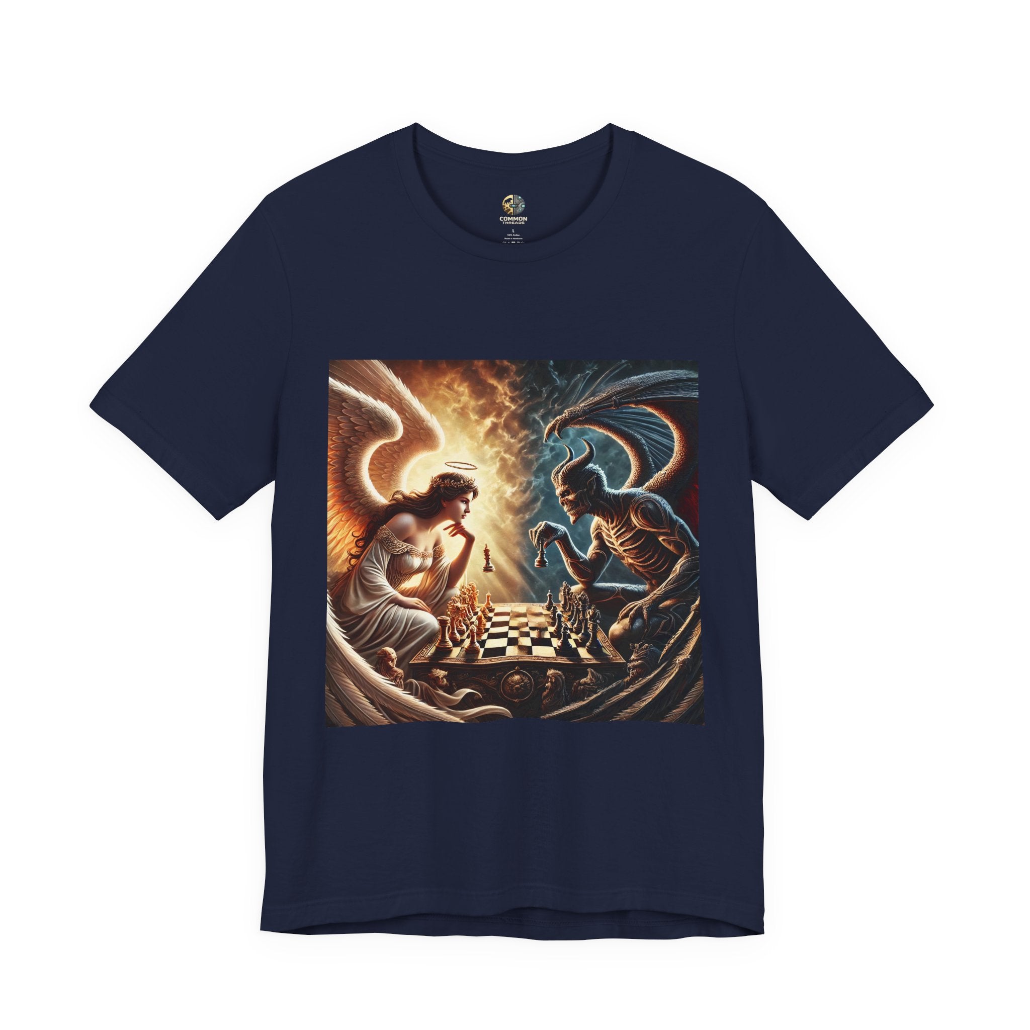 Navy blue T-shirt featuring a graphic of an angel and a demon playing chess, with a golden king piece levitating, a dark background behind the demon and warm light tones behind the angel