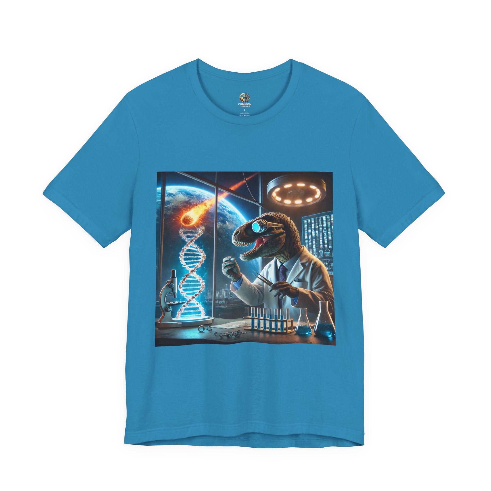 Aqua blue t-shirt featuring a dinosaur in a space lab conducting experiments, with Earth visible outside being hit by a meteor