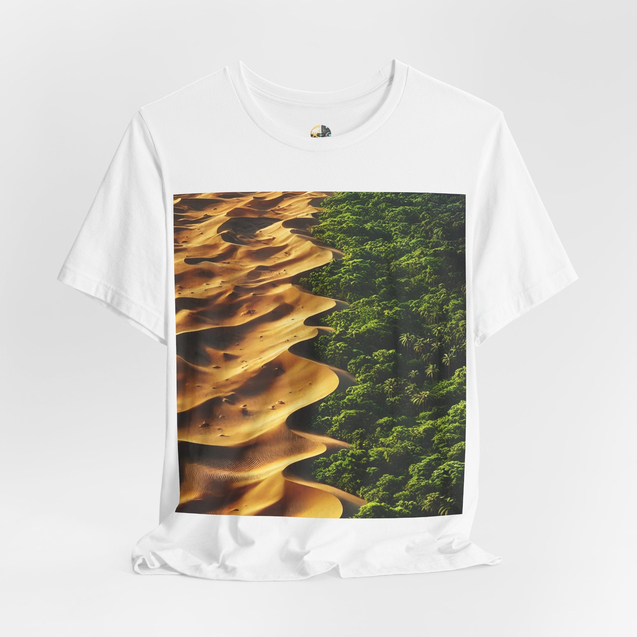 White T-shirt featuring a split landscape with golden desert sand dunes on one side and a dense green rainforest on the other