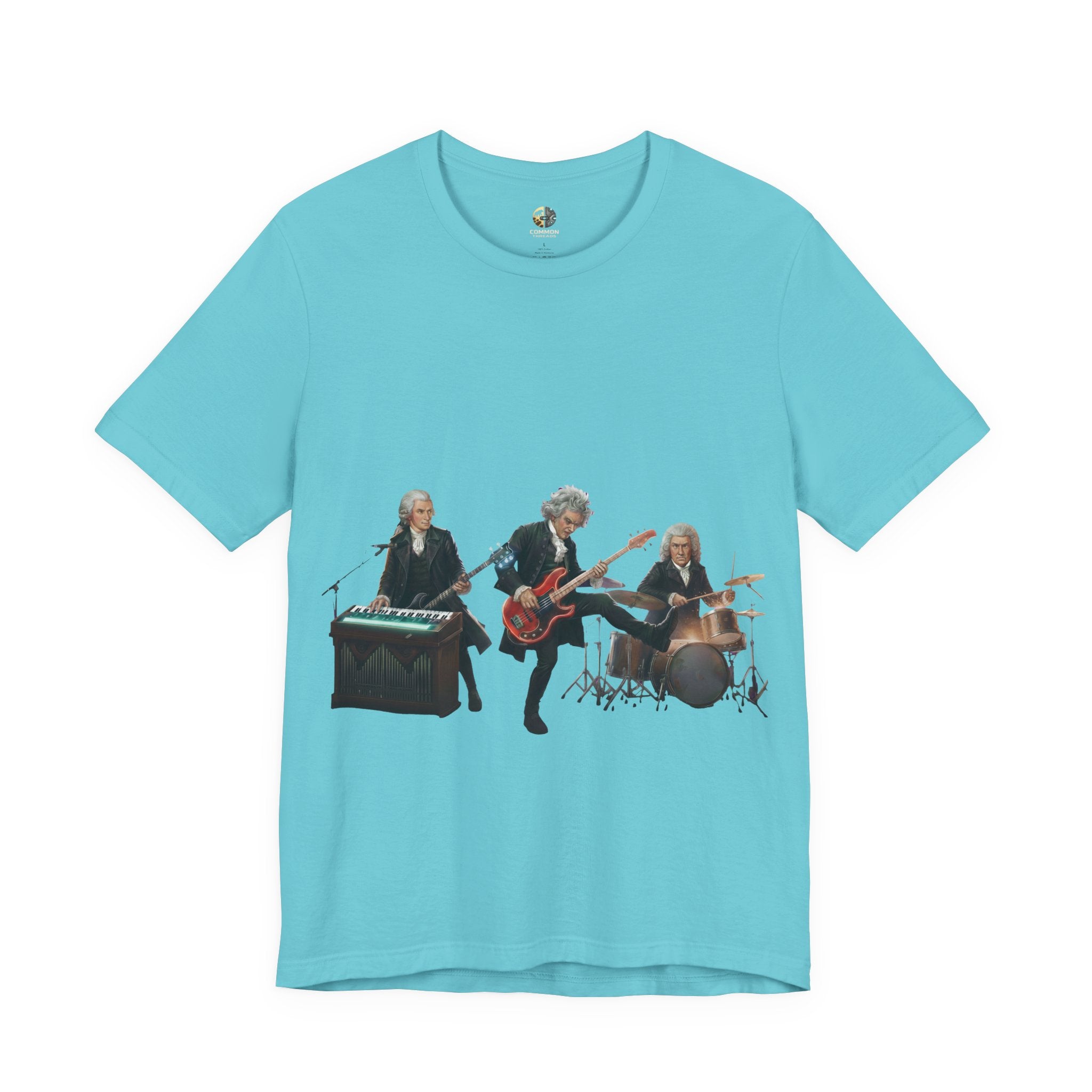 Turquoise t-shirt featuring Mozart on bass and keyboard, Beethoven on electric guitar, and Bach on drums in a rock band scene