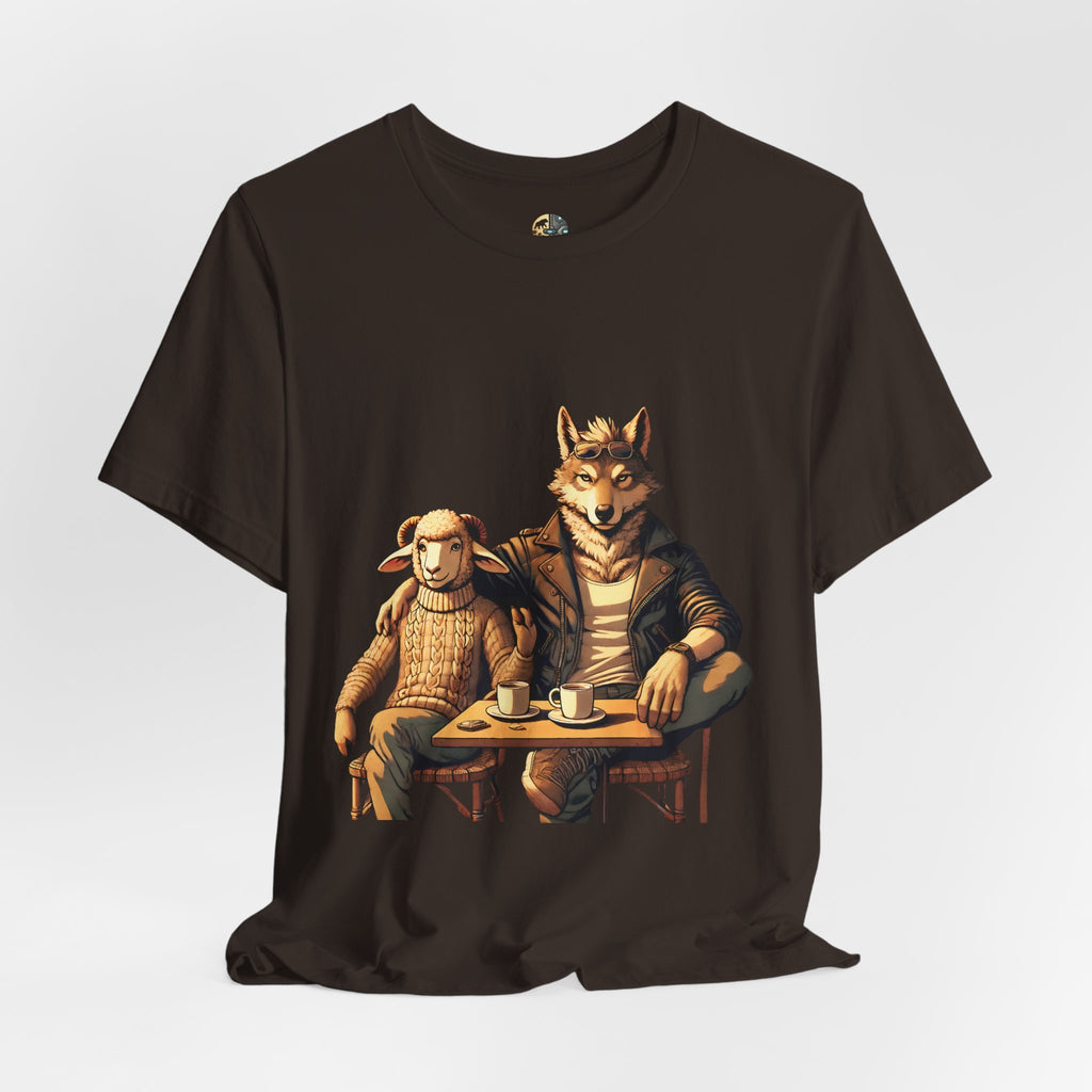 Brown T-shirt featuring an anthropomorphic wolf and lamb seated at a café table with coffee cups, illustrated in warm, painterly tones