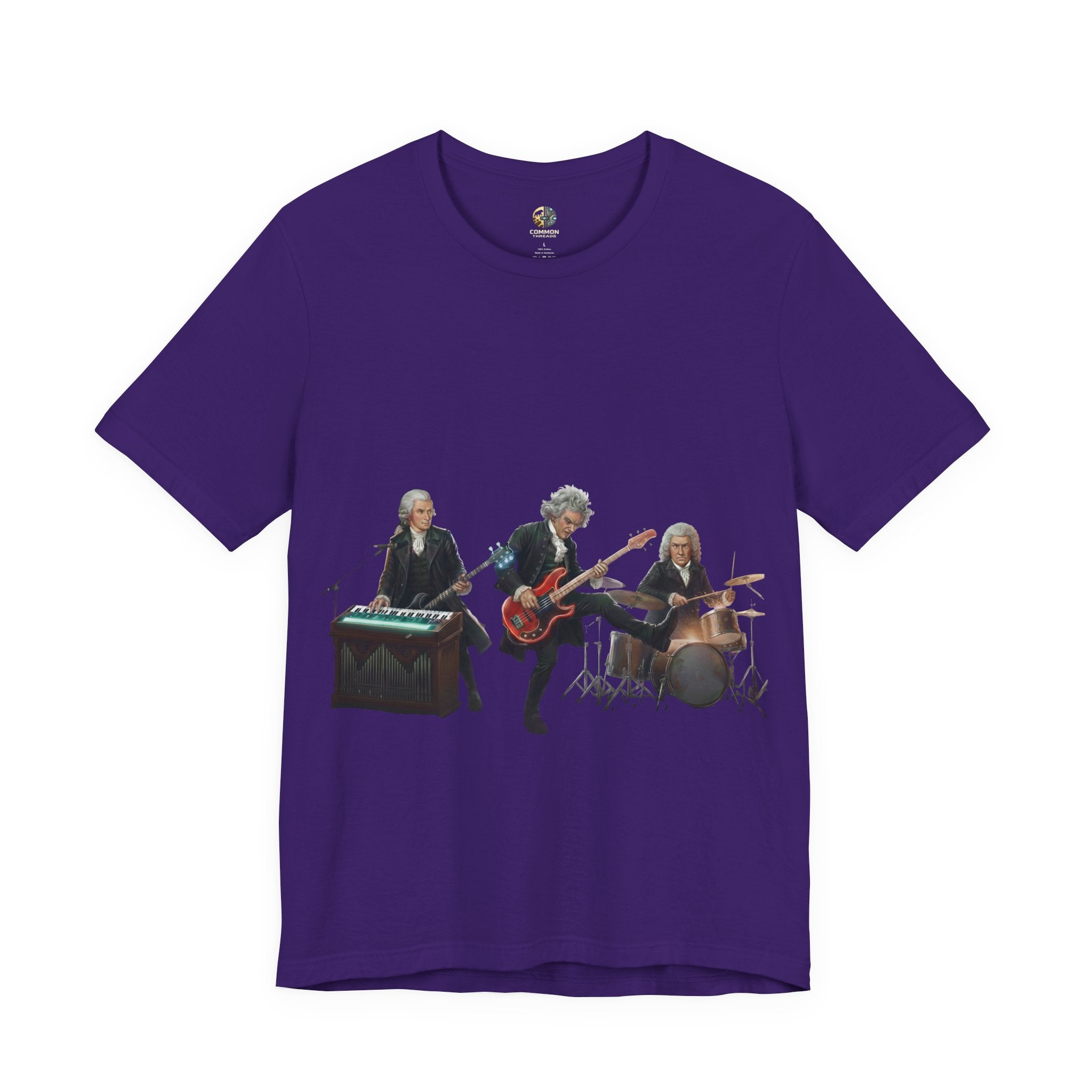 Purple t-shirt featuring Mozart on bass and keyboard, Beethoven on electric guitar, and Bach on drums in a rock band scene