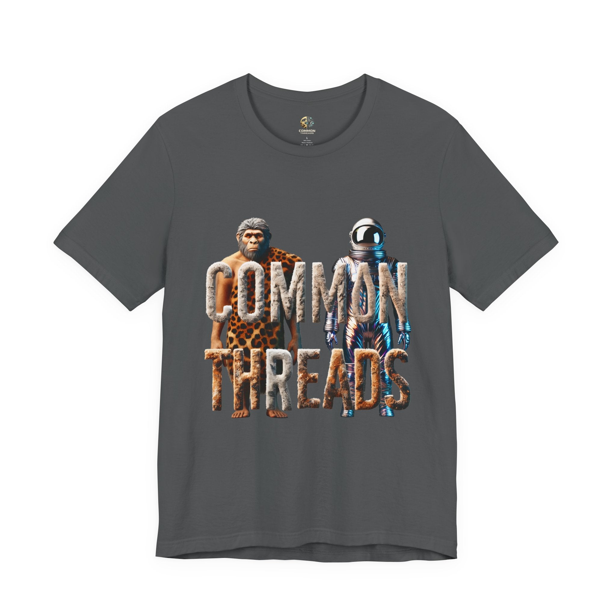 Asphalt grey T-shirt featuring a graphic of a caveman in animal pelts standing beside a chrome-plated astronaut, with the text ‘Common Threads‘