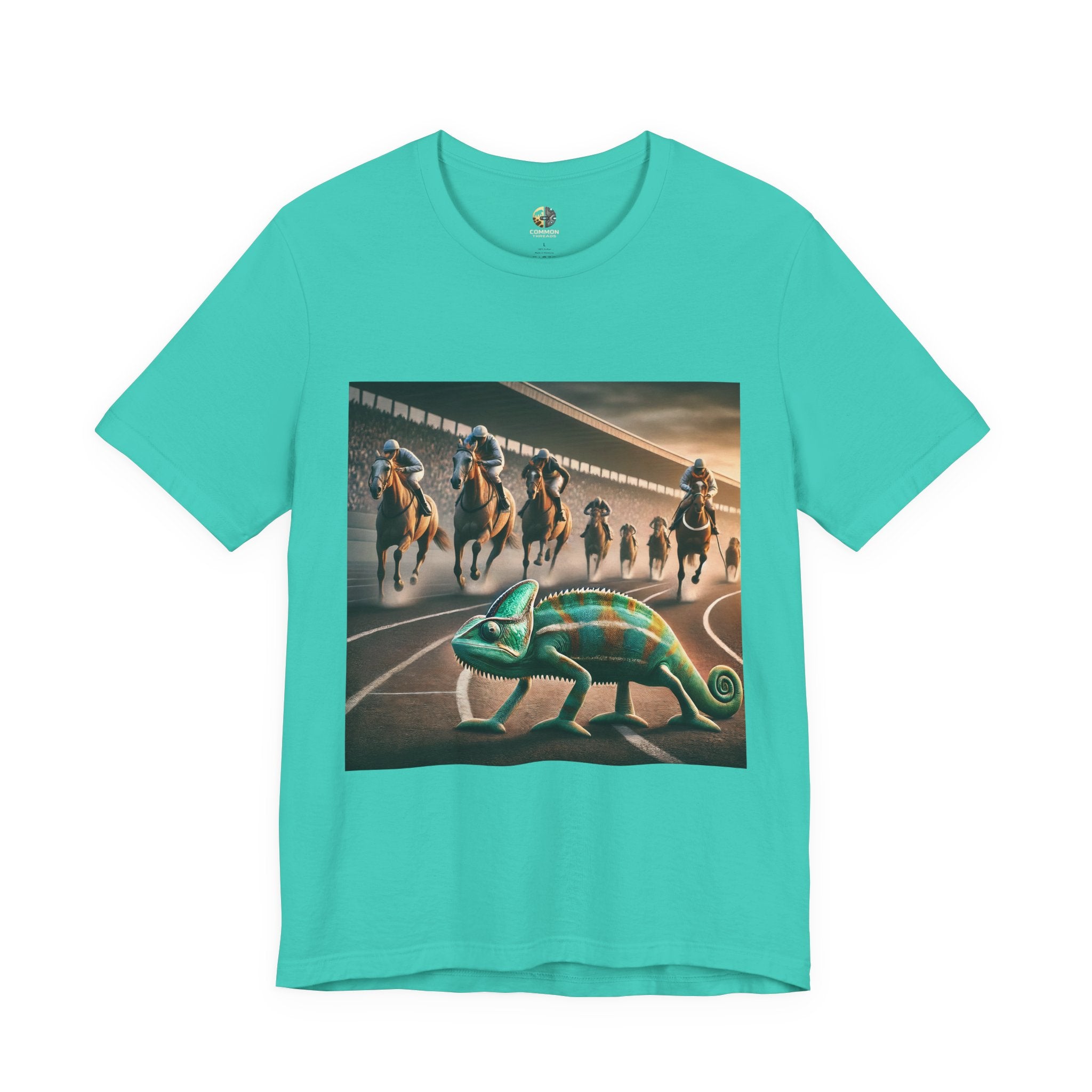 Teal T-shirt featuring a chameleon on a racetrack with a pack of racehorses approaching from behind